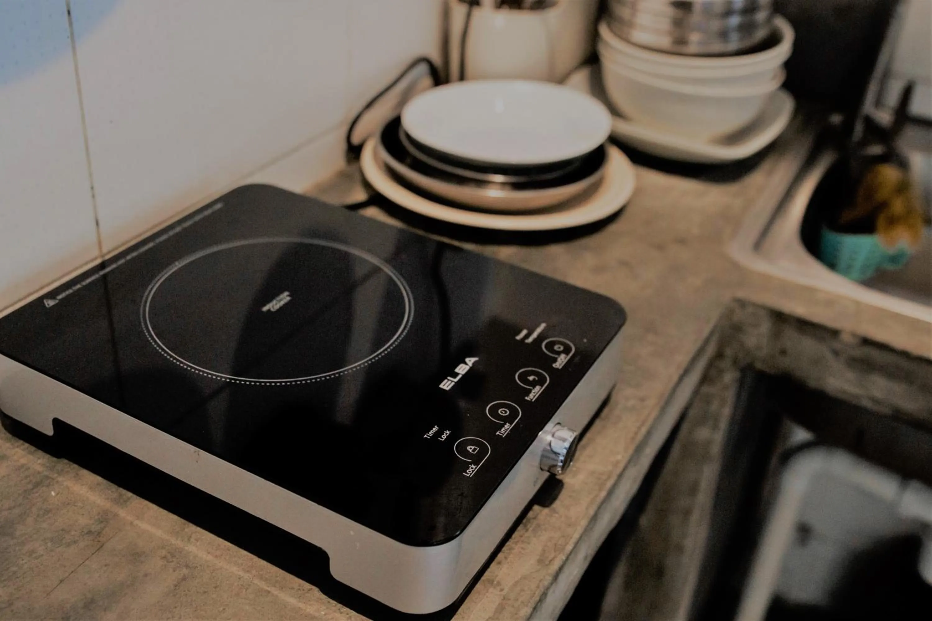 Communal kitchen in Bed Attitude Hostel Cenang