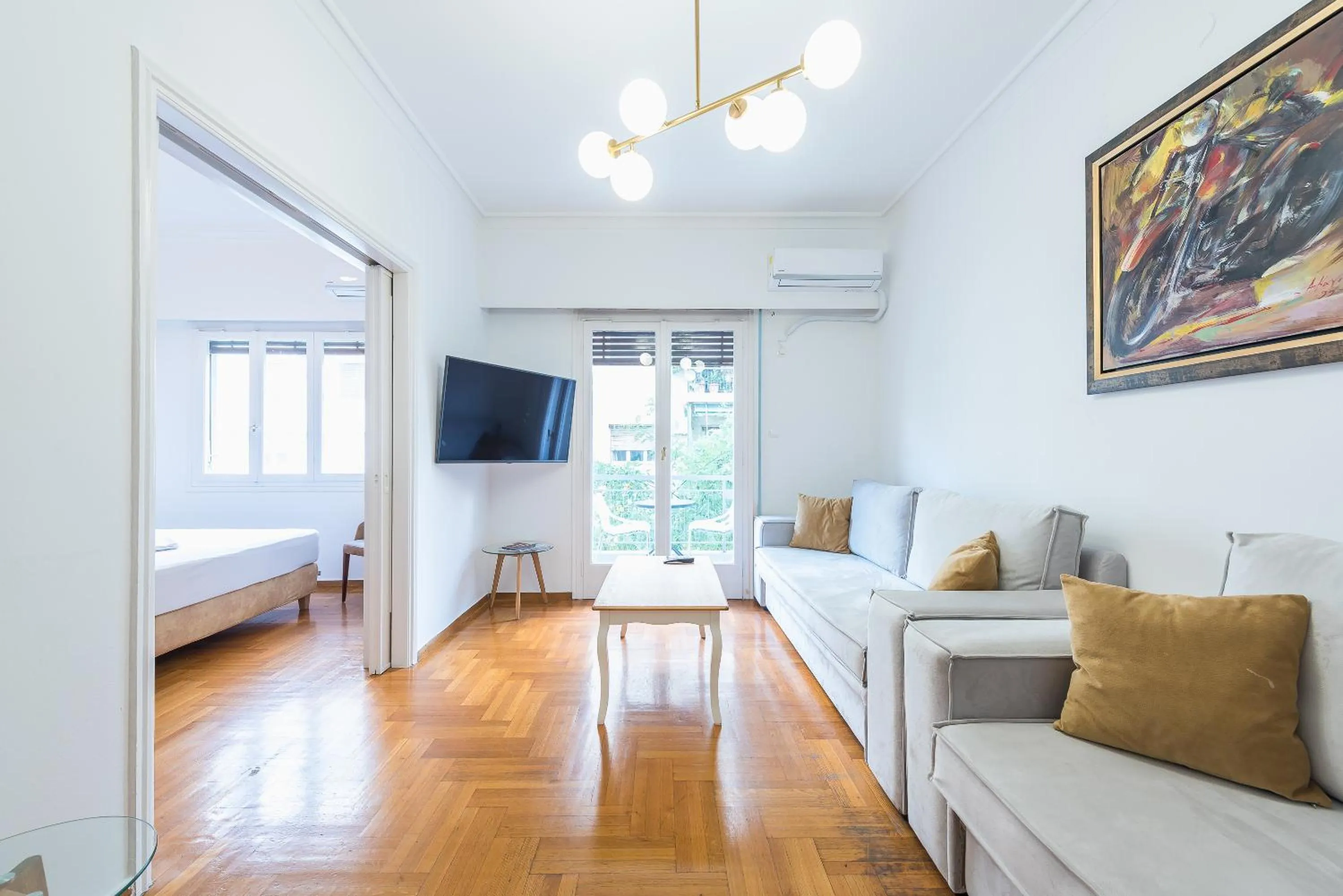 Bed in Victoria Queens Suites Apartments