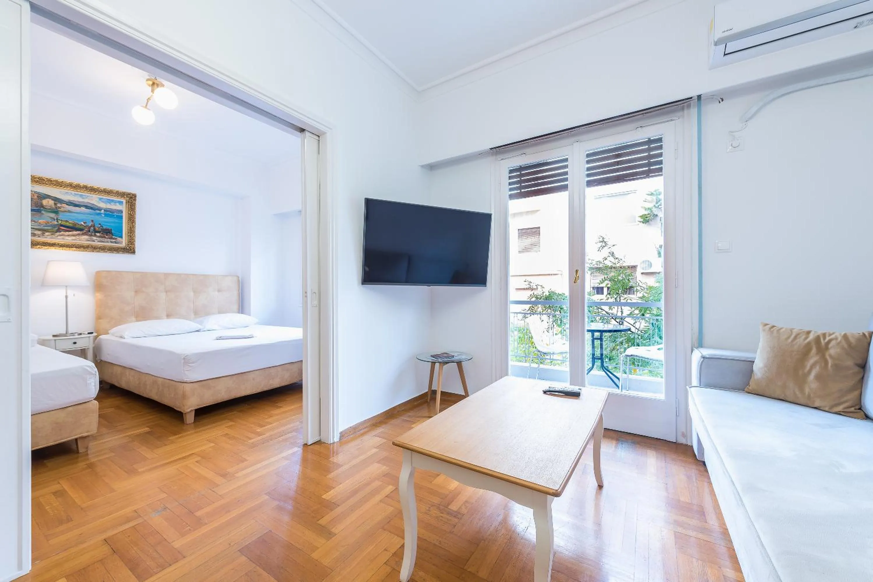 Bed in Victoria Queens Suites Apartments