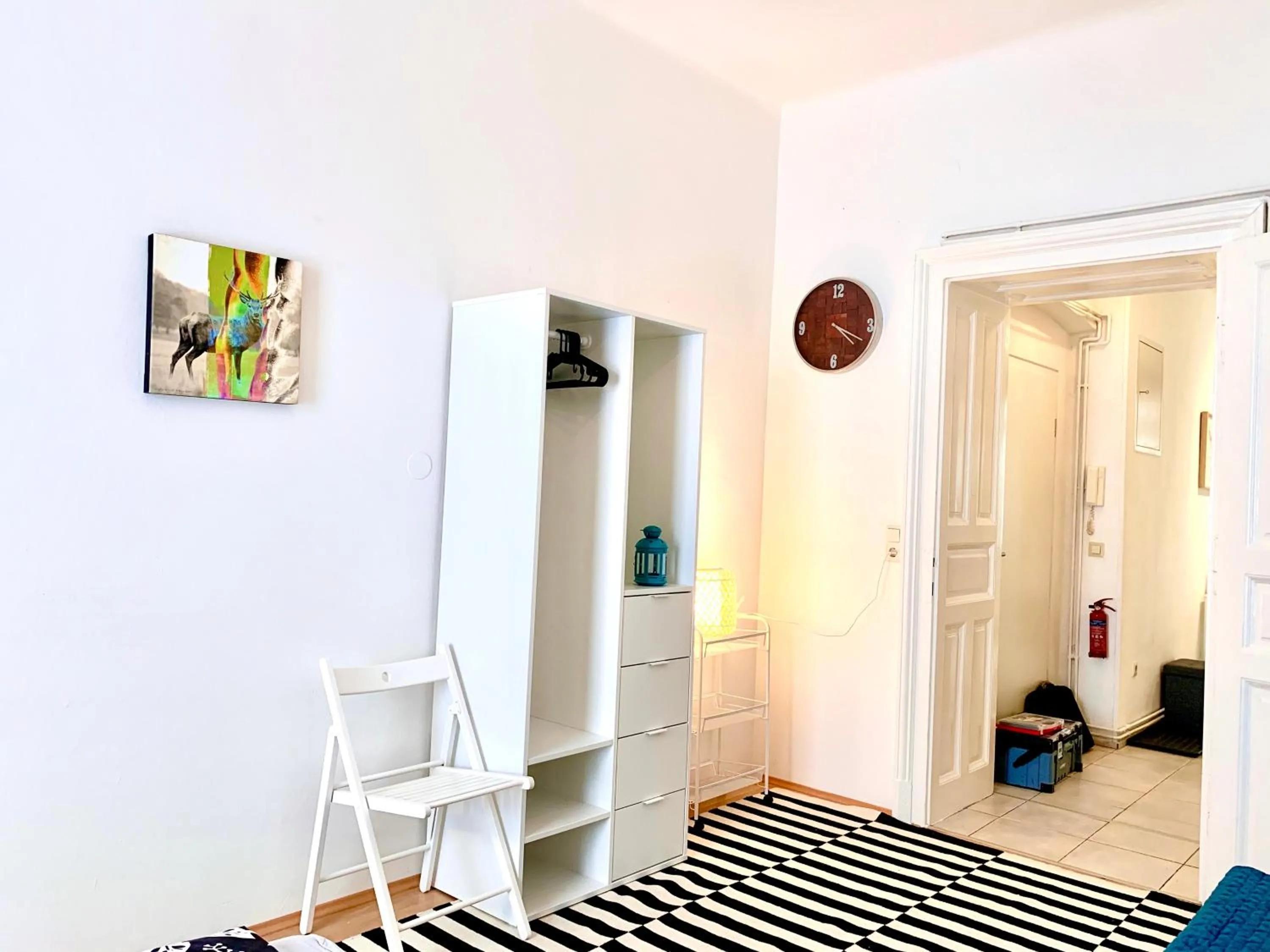 Living room in Charming City Apartment - by Nahuen Suites