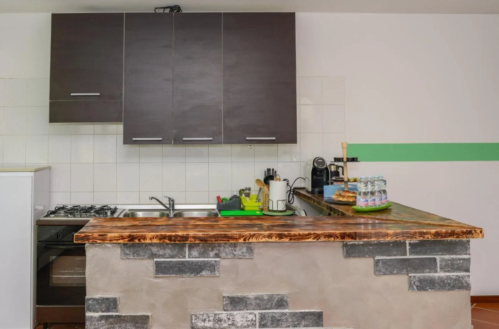 Kitchen or kitchenette in Loft Free Parking Agli Ulivi moderno e spazioso