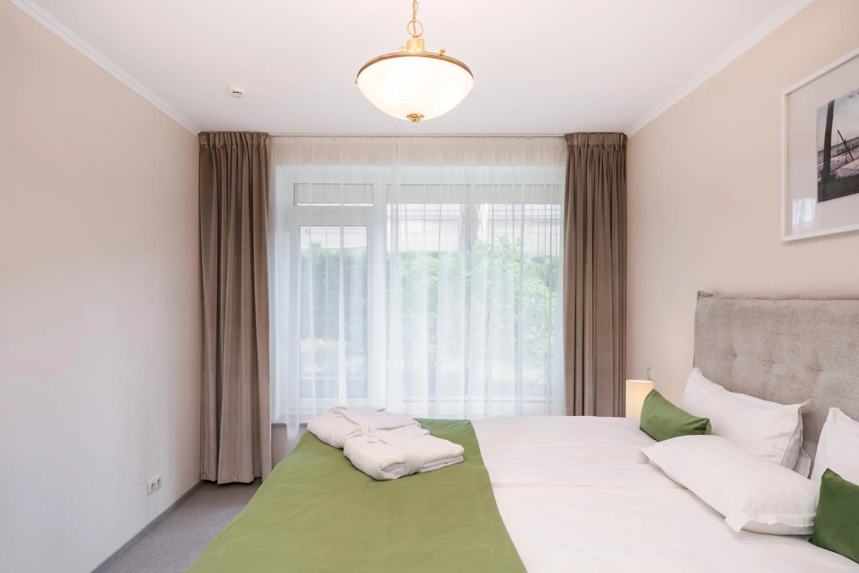 Bed in Villa Alvīne Family Apart-Hotel