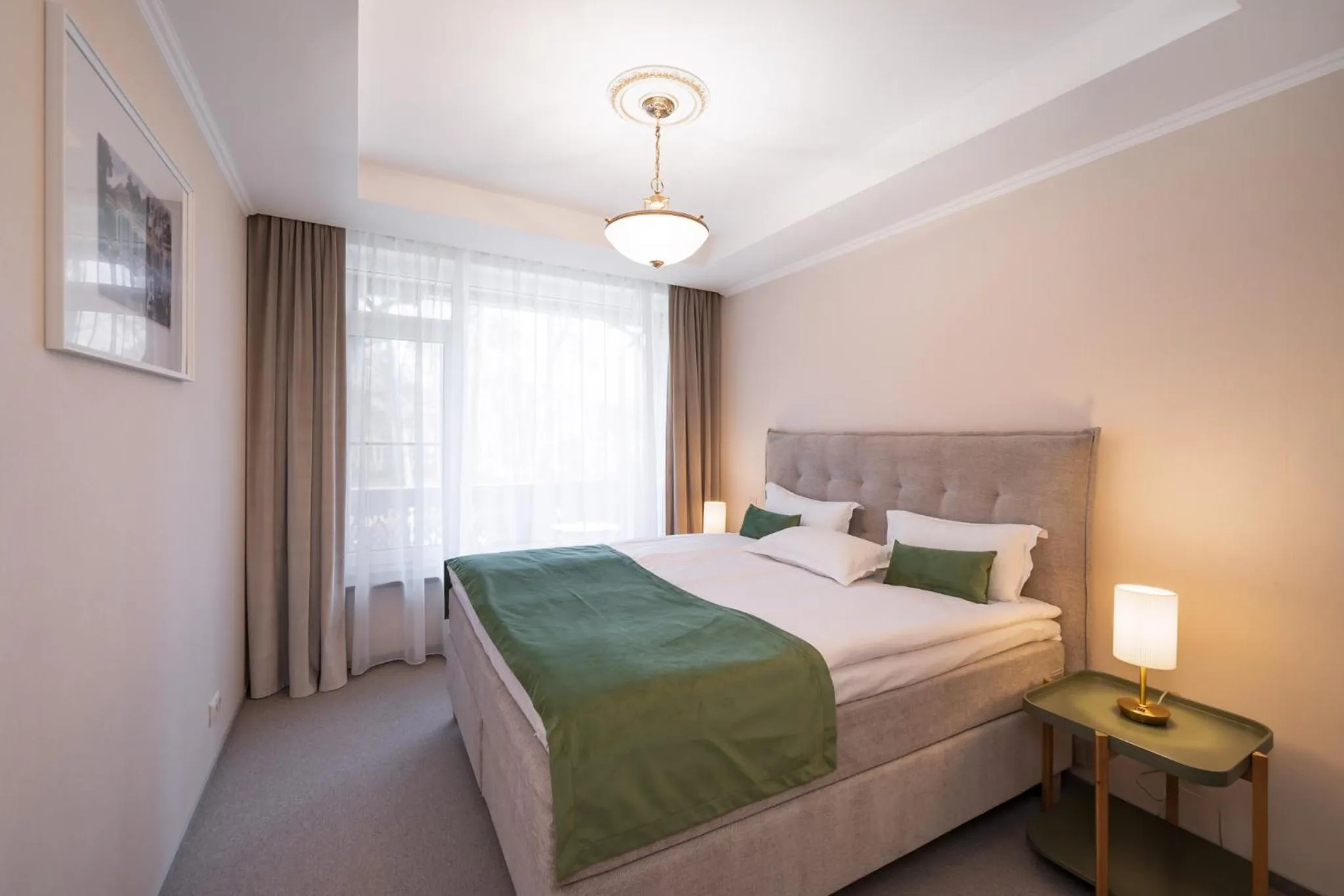 Bed in Villa Alvīne Family Apart-Hotel