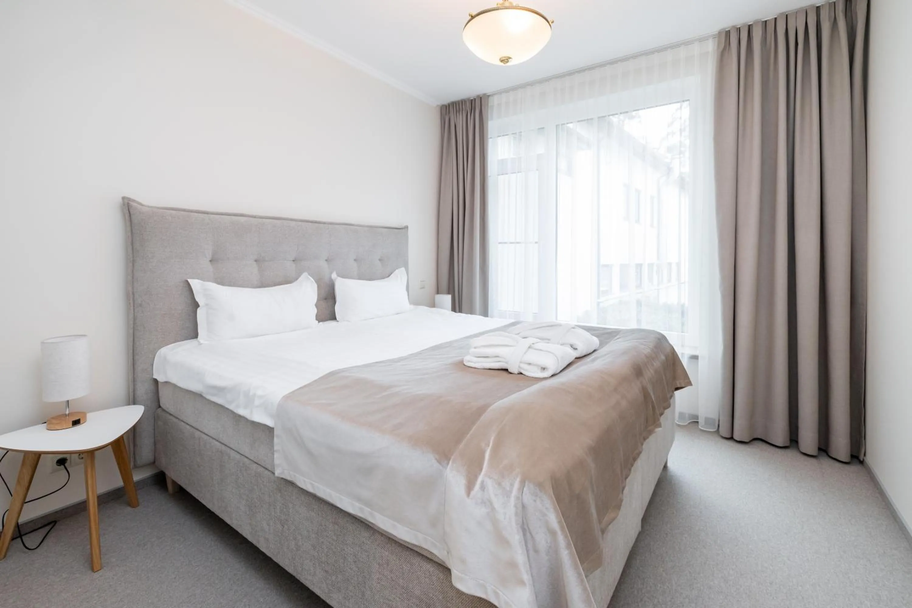 Bed in Villa Alvīne Family Apart-Hotel