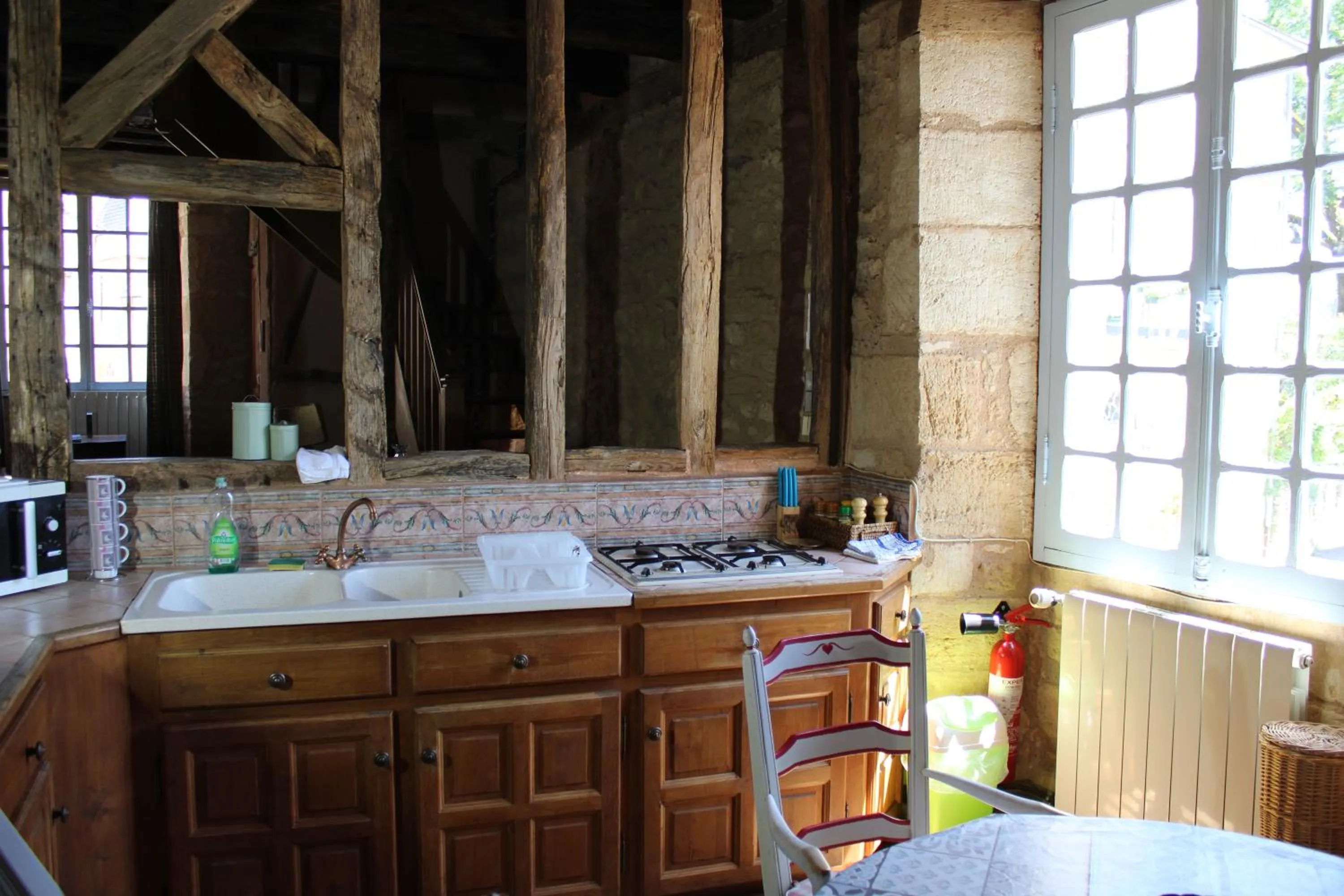 Kitchen or kitchenette in La Roseraie Hôtel Restaurant