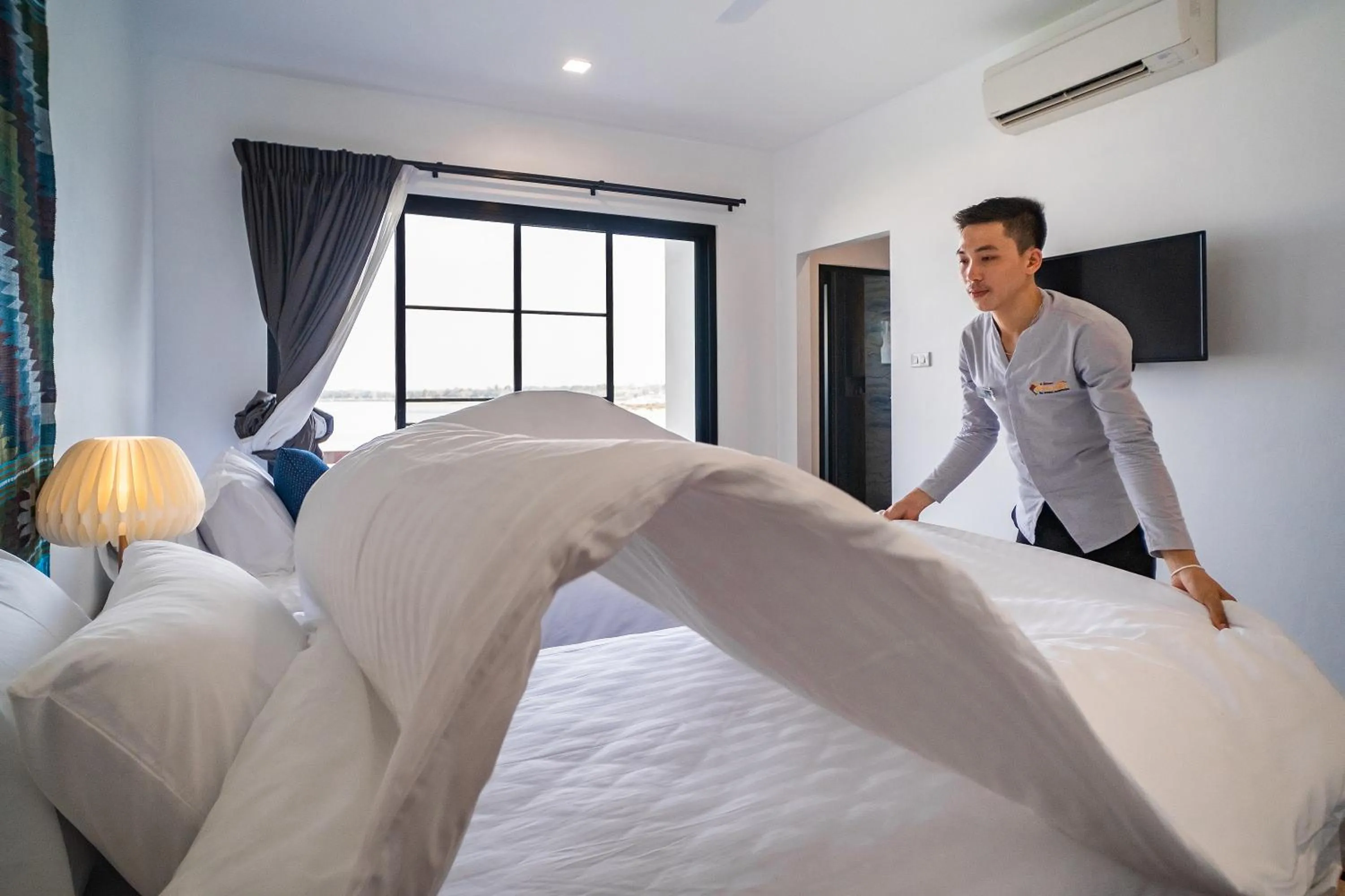 Staff, Bed in The Riviera Champasak