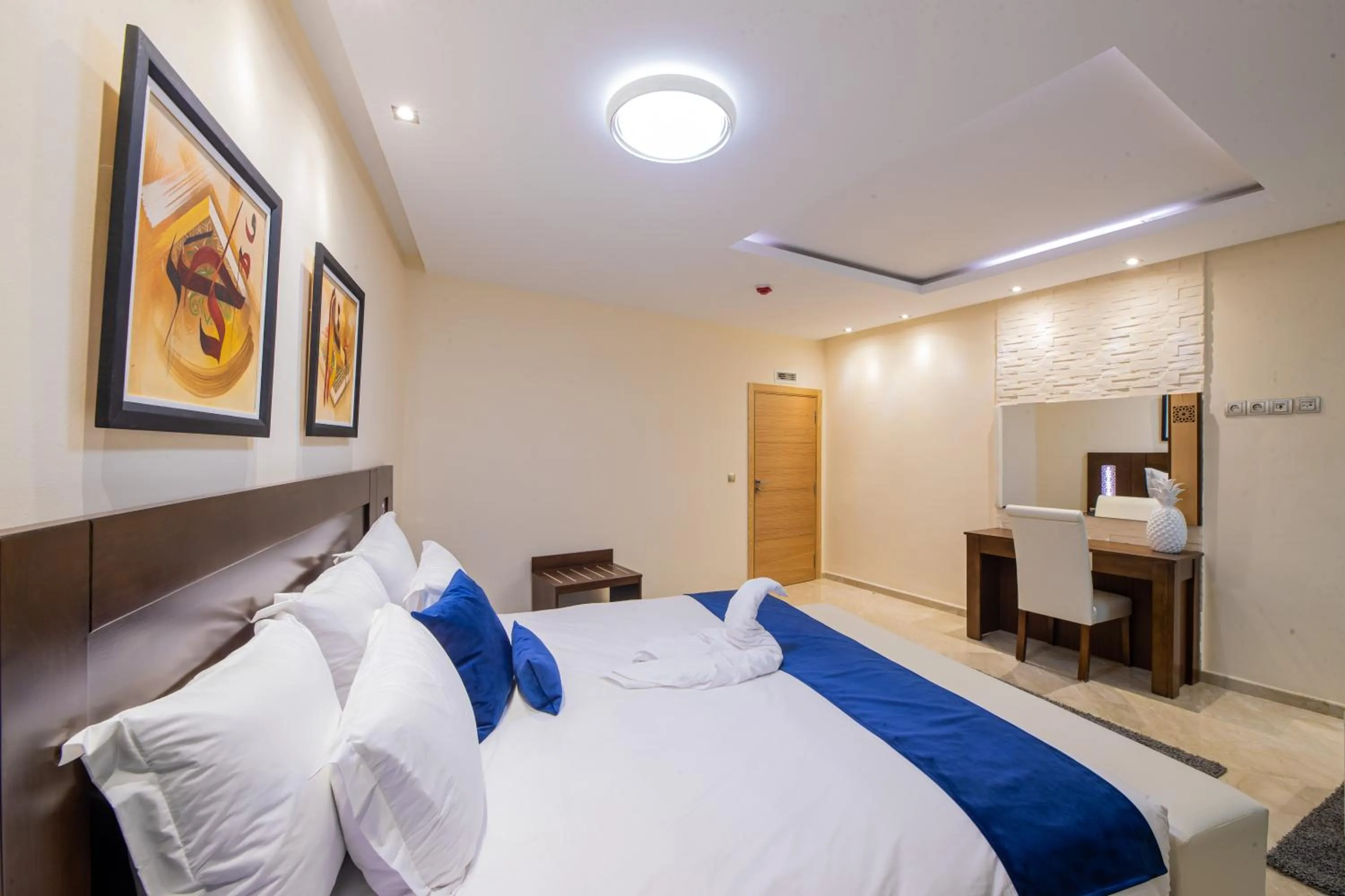 Bed in Appart-hotel Marrakech Inn