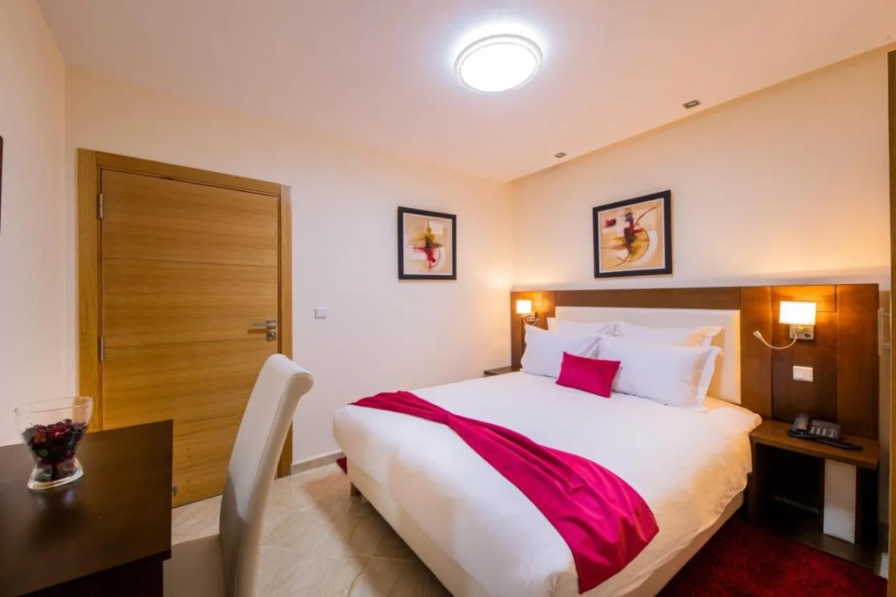 Bed in Appart-hotel Marrakech Inn
