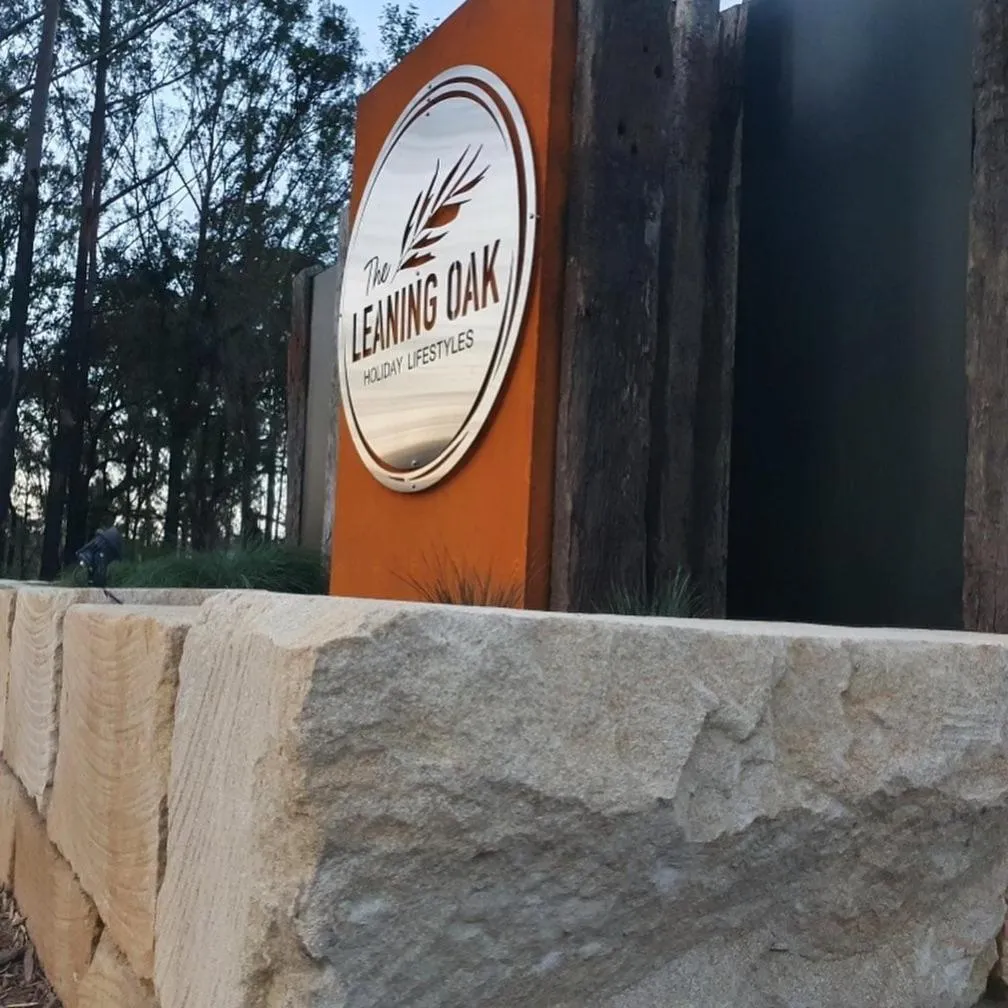 Property logo or sign in The Leaning Oak Holiday Lifestyles - Lake Conjola