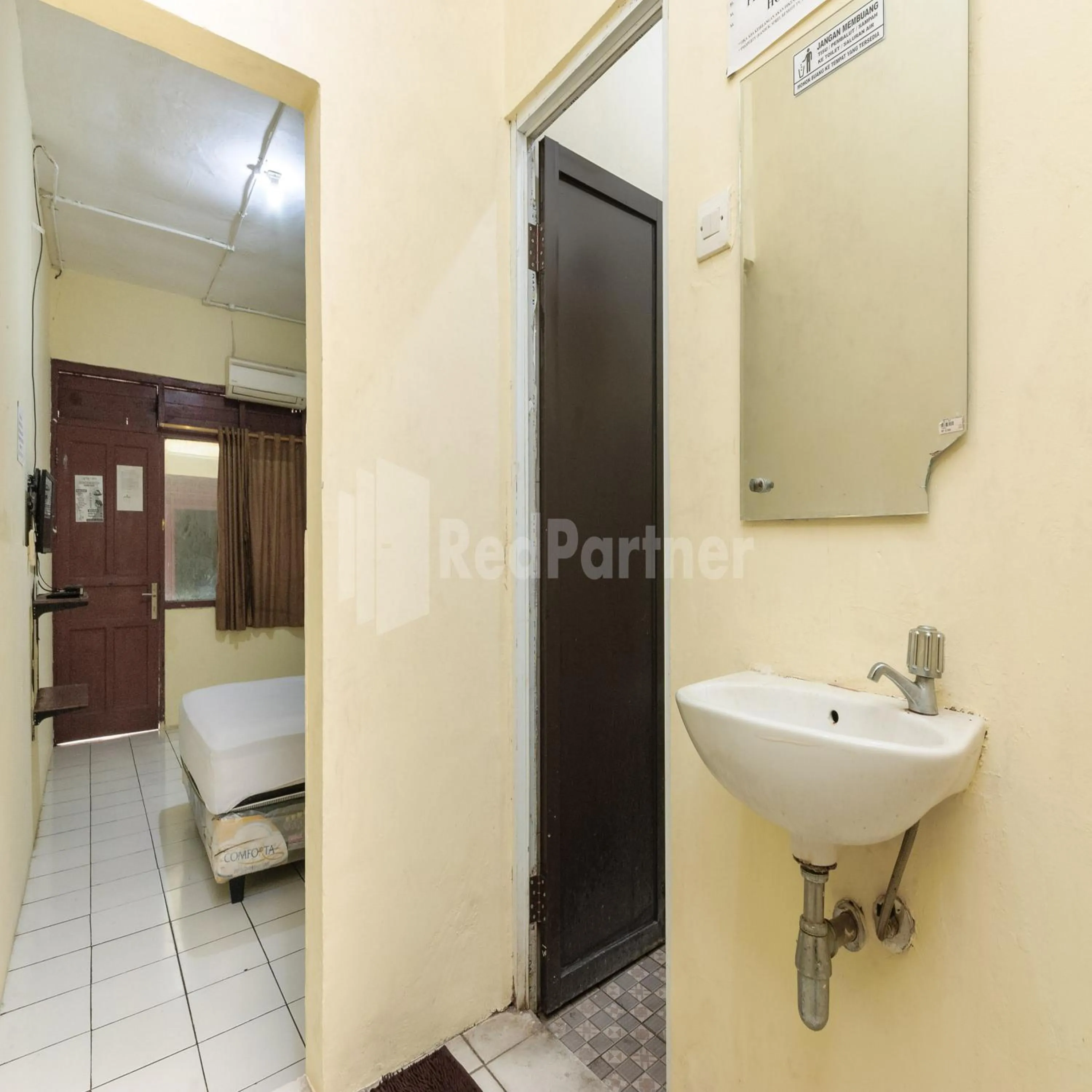 Bedroom in SUPER OYO 591 Mn Residence Syariah