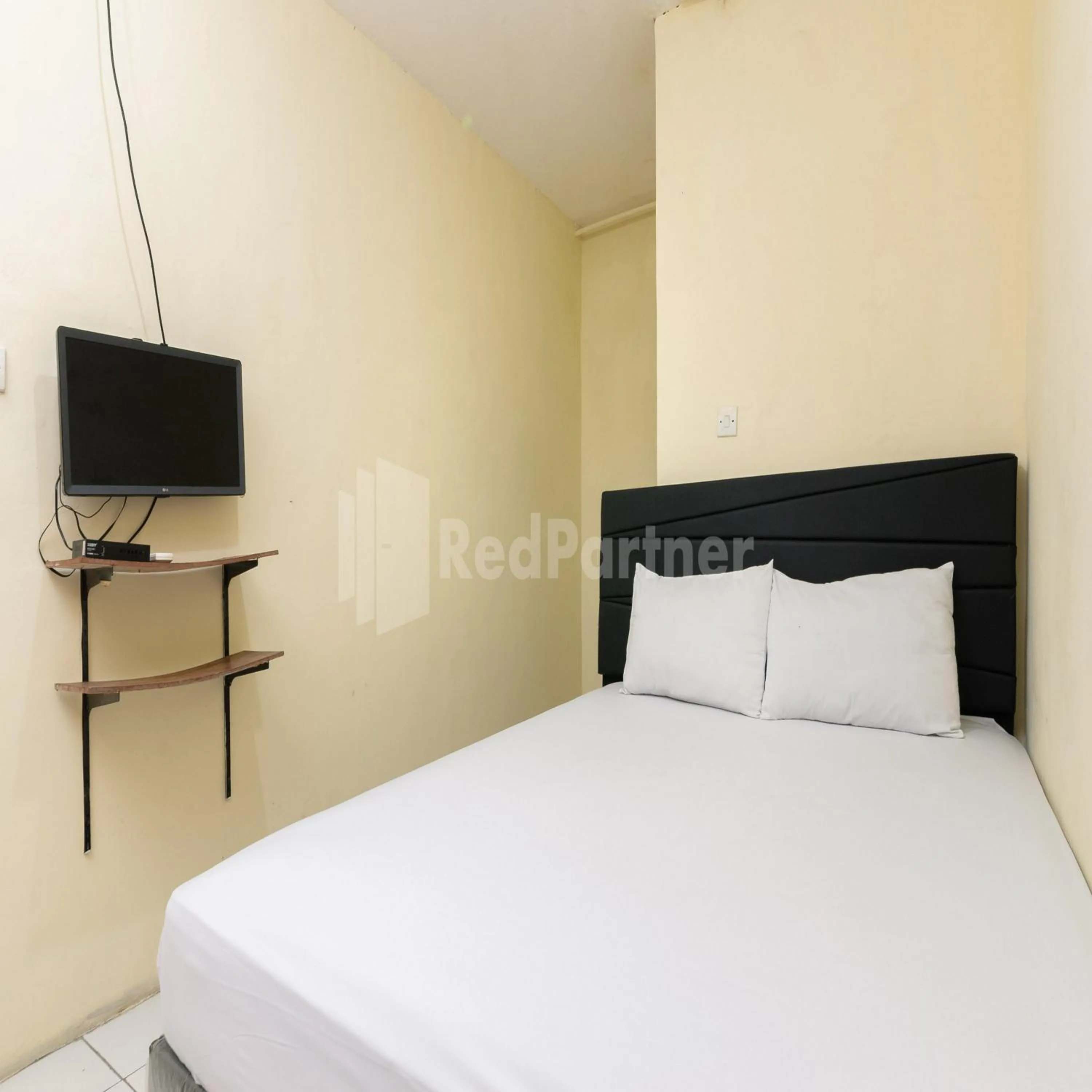 Bedroom, Bed in SUPER OYO 591 Mn Residence Syariah