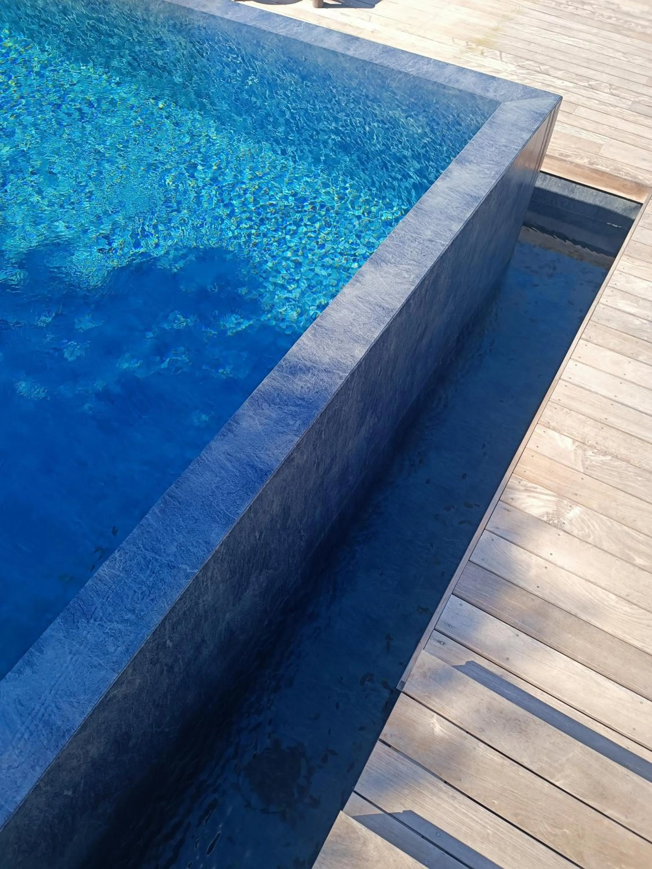 Swimming pool in Hôtel Les Suites Du Maquis