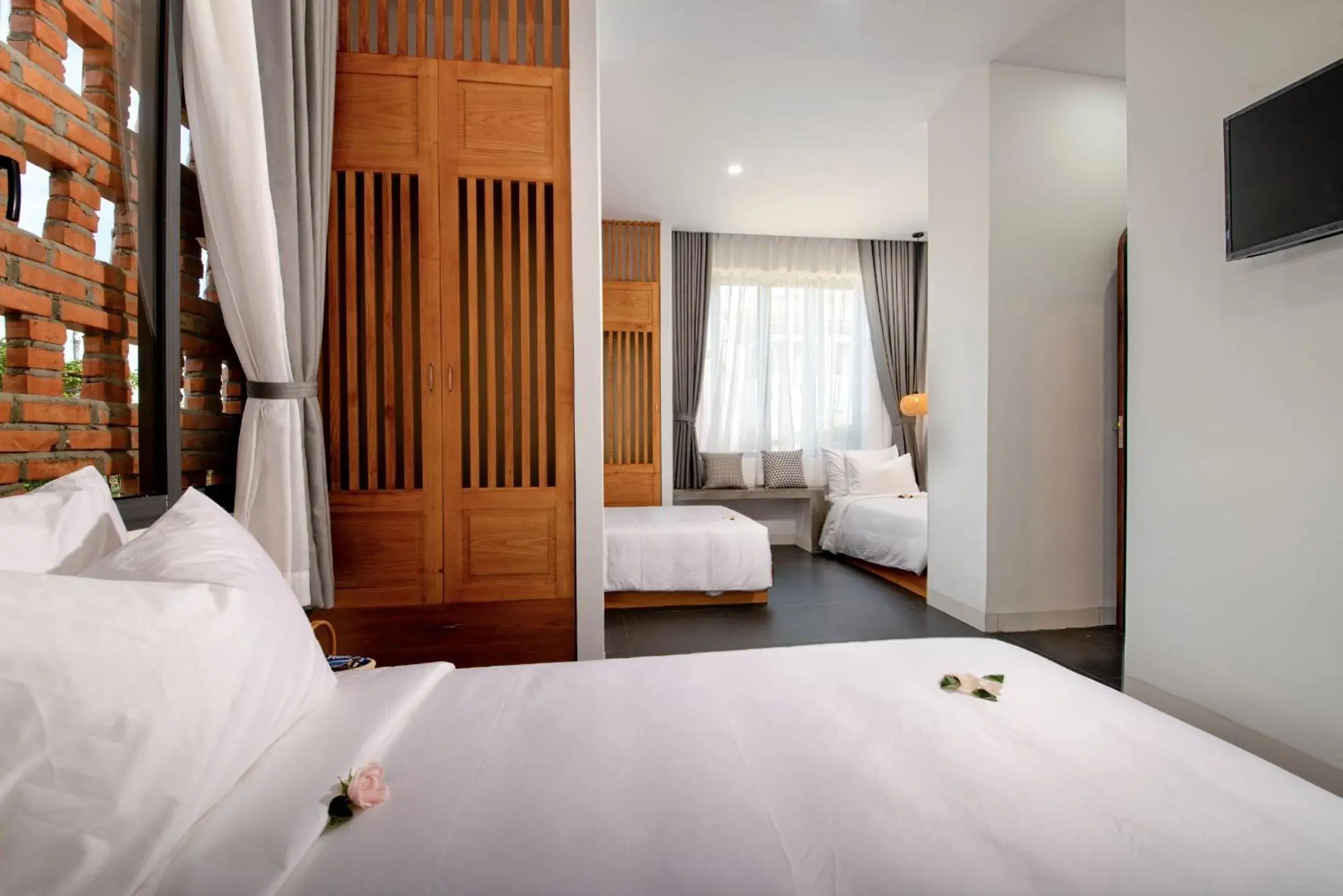 Deluxe Triple Room in The 1993 Homestay Deluxe Triple Room in The 1993 Homestay