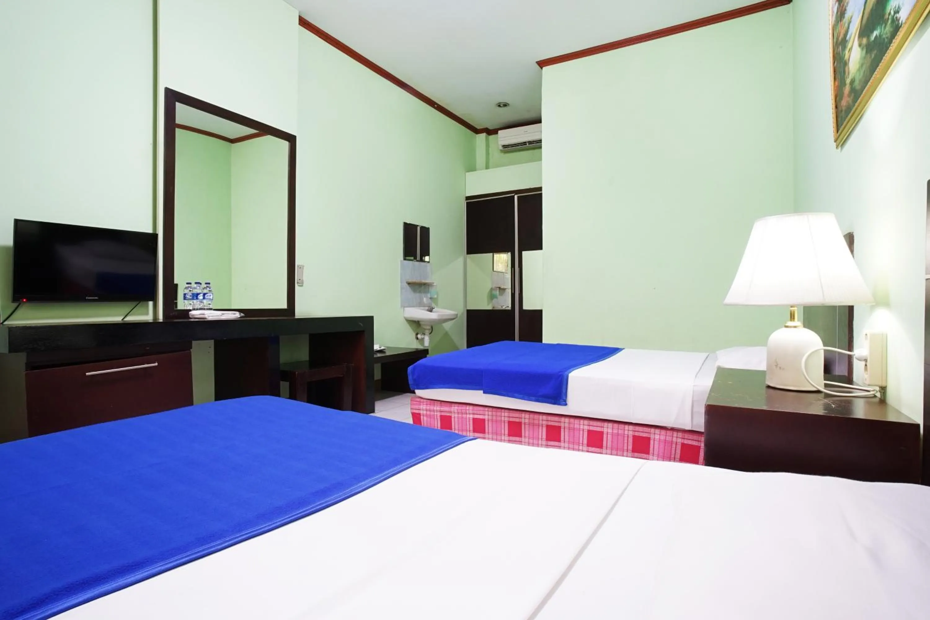 Bedroom, Bed in Hotel Bandung Permai