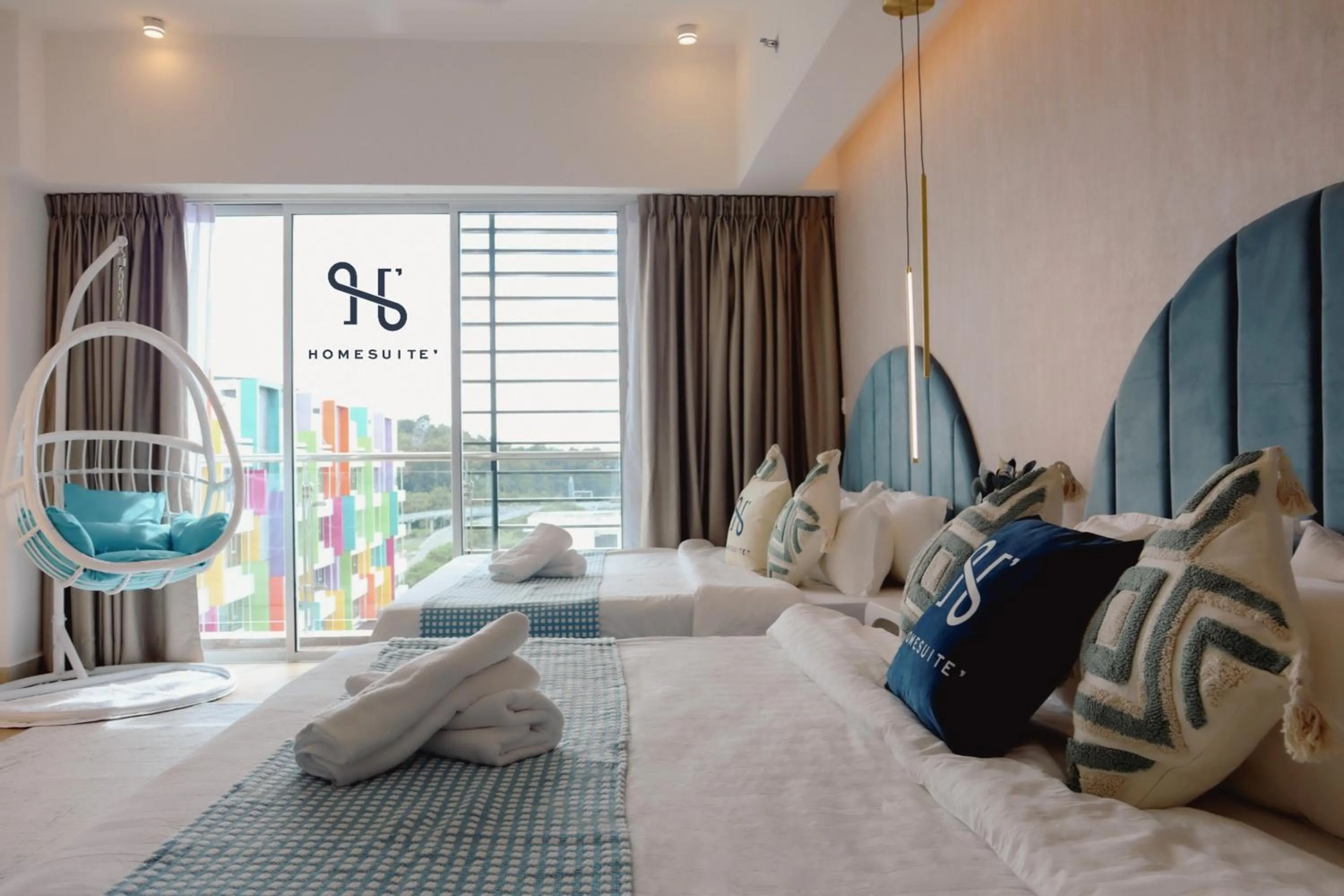 Photo of the whole room, Bed in Homesuite' Home at Aeropod SOVO