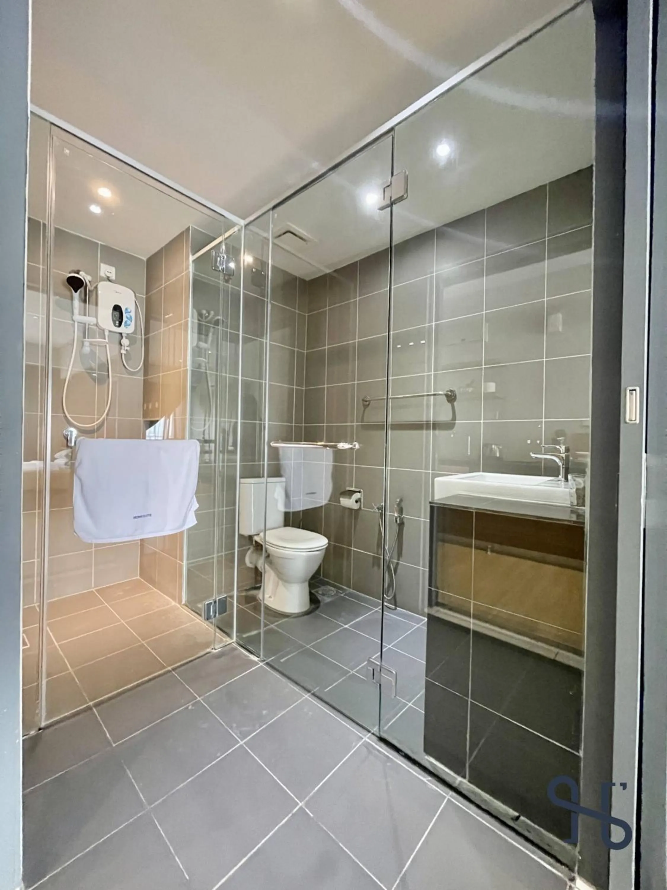 Shower in Homesuite' Home at Aeropod SOVO