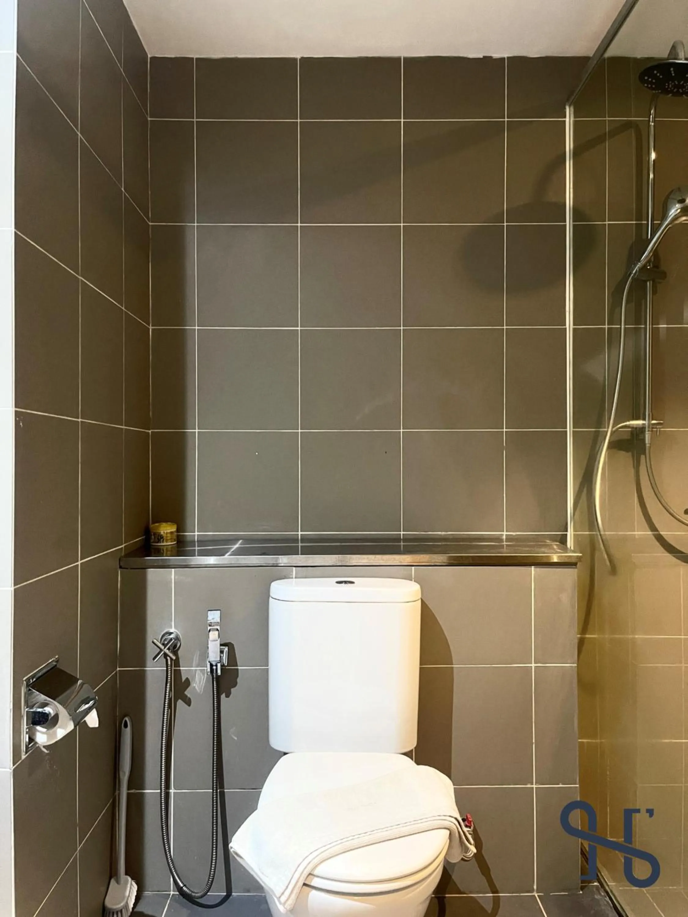 Toilet in Homesuite' Home at Aeropod SOVO