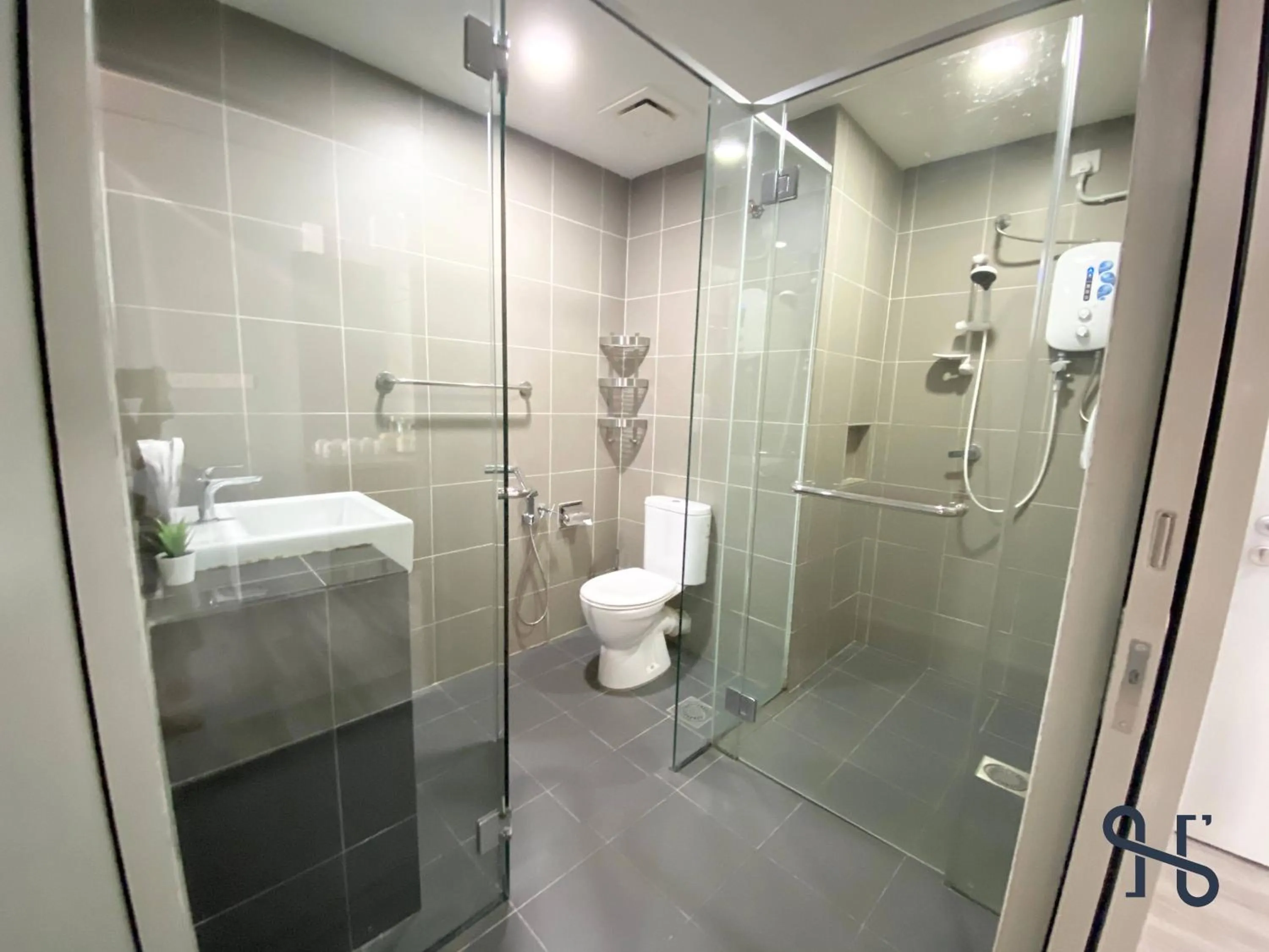 Bathroom in Homesuite' Home at Aeropod SOVO