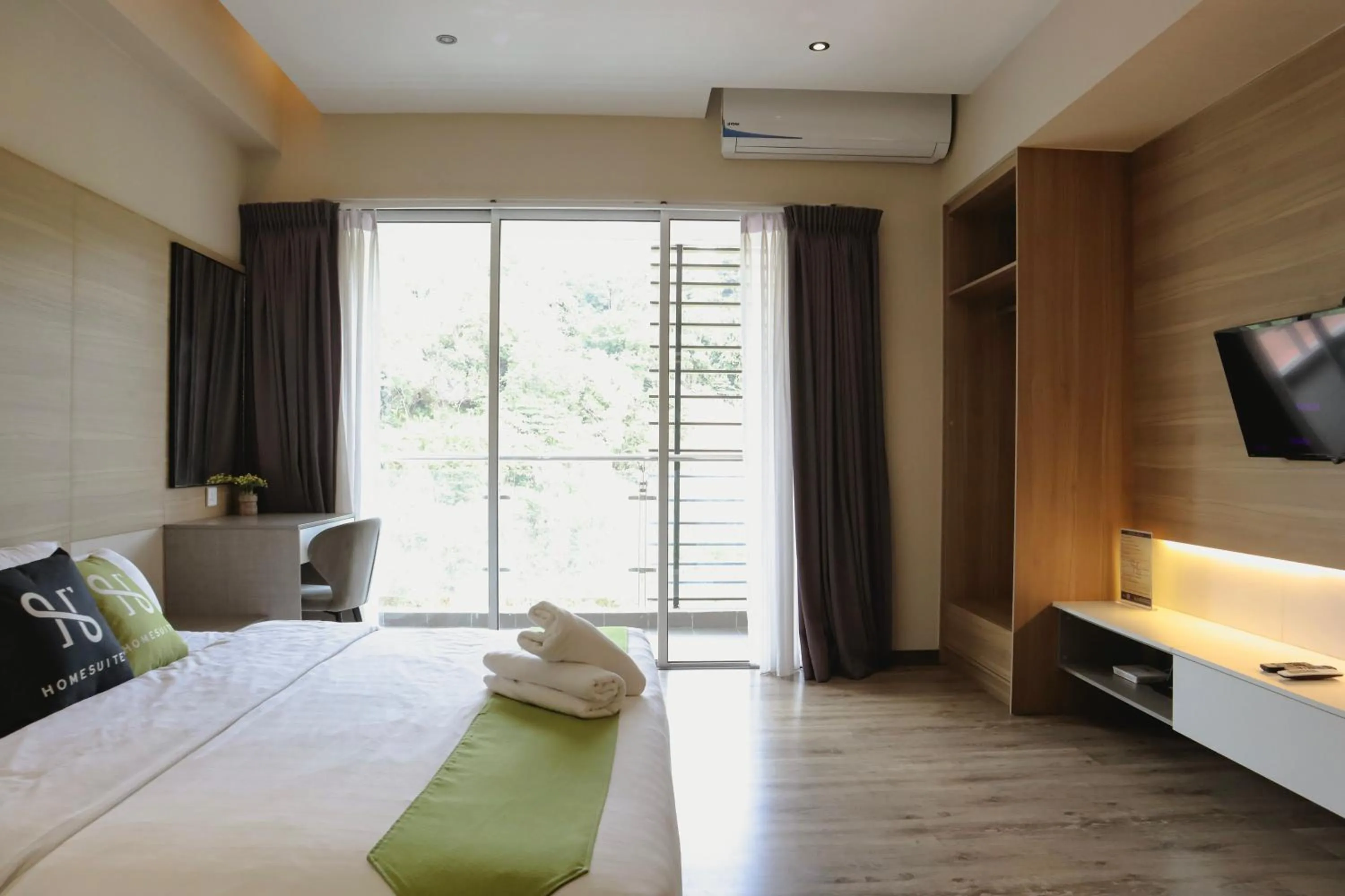 View (from property/room), Bed in Homesuite' Home at Aeropod SOVO