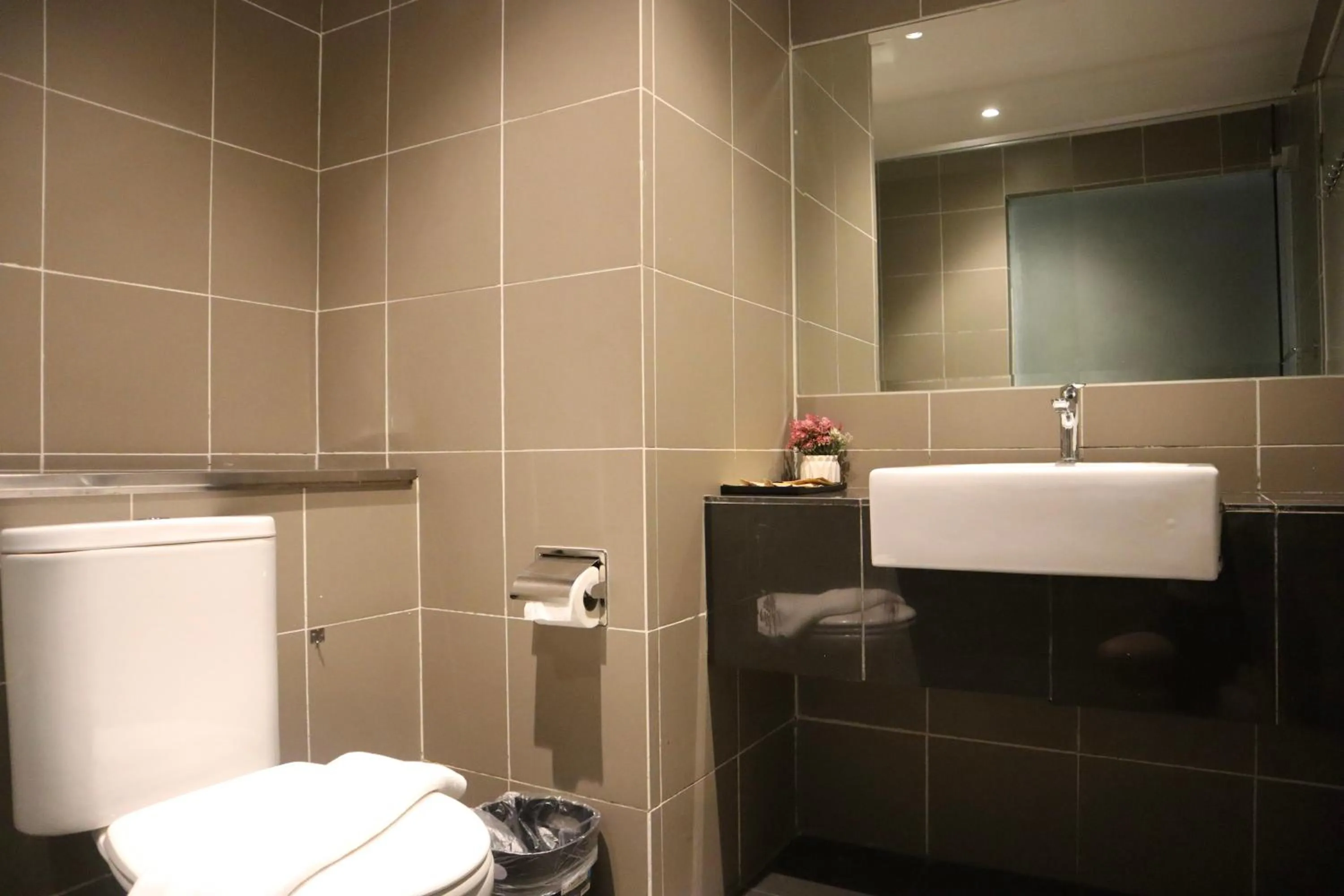 Toilet in Homesuite' Home at Aeropod SOVO