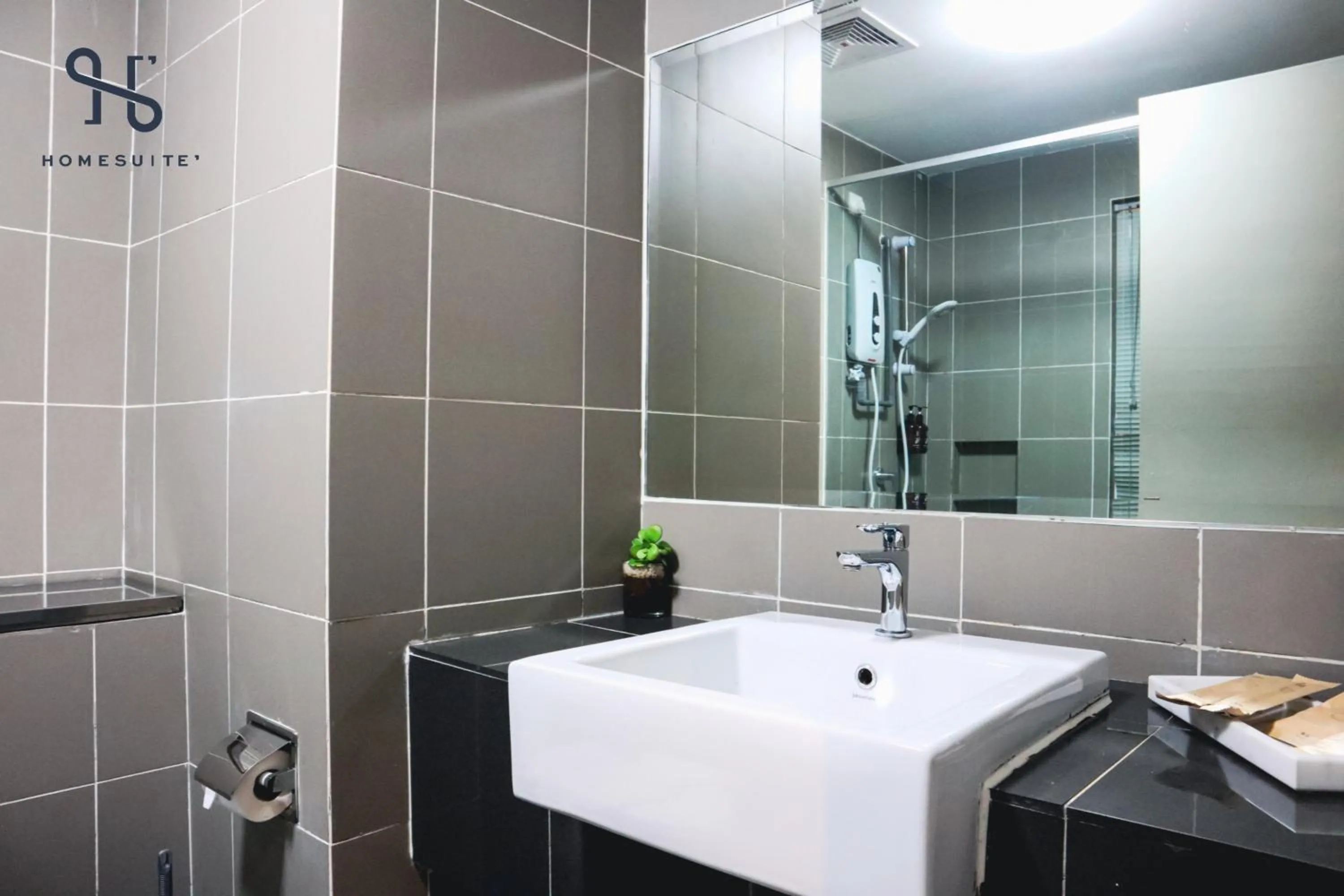 Shower in Homesuite' Home at Aeropod SOVO