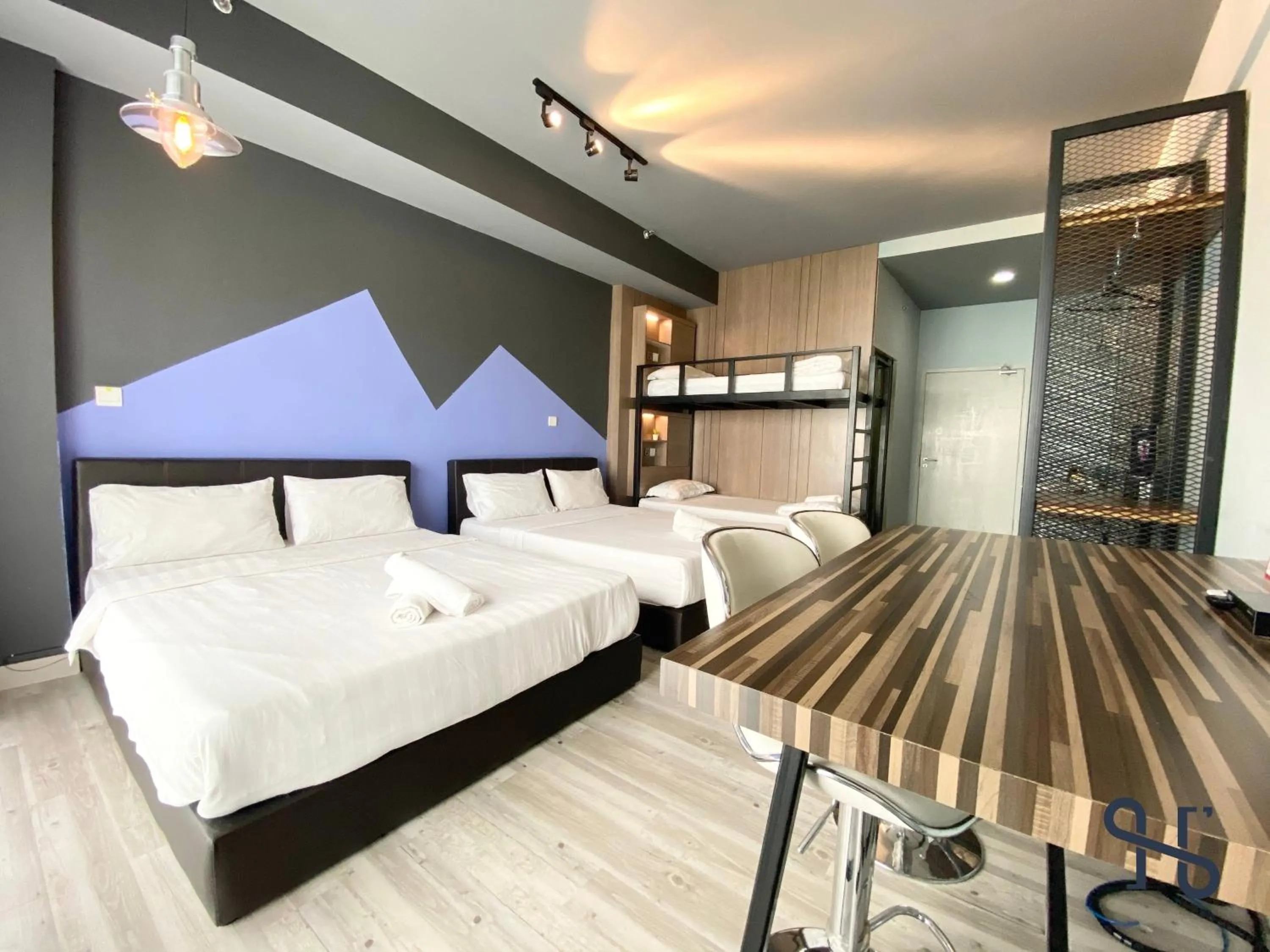 Bed in Homesuite' Home at Aeropod SOVO