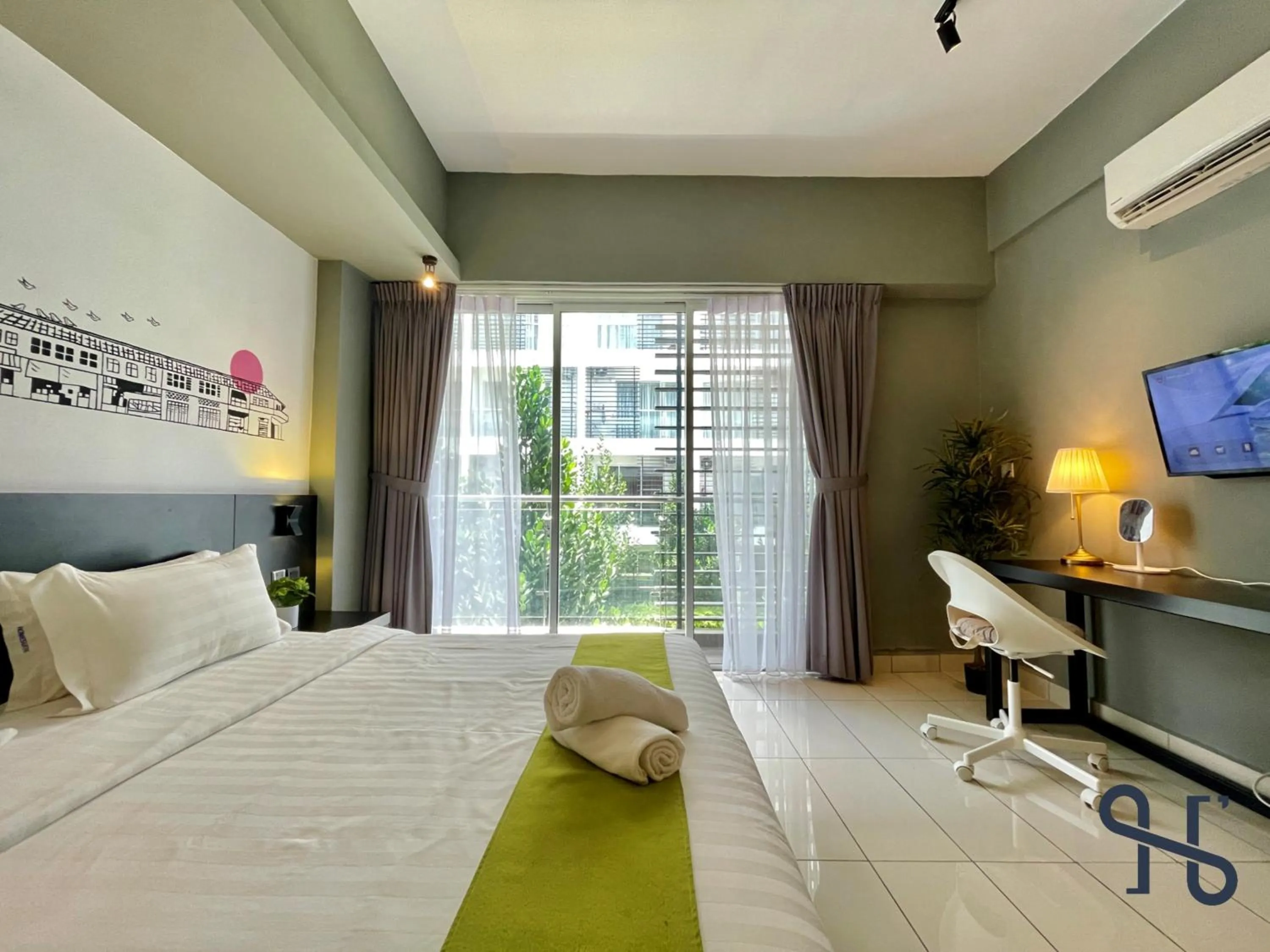 Bed in Homesuite' Home at Aeropod SOVO