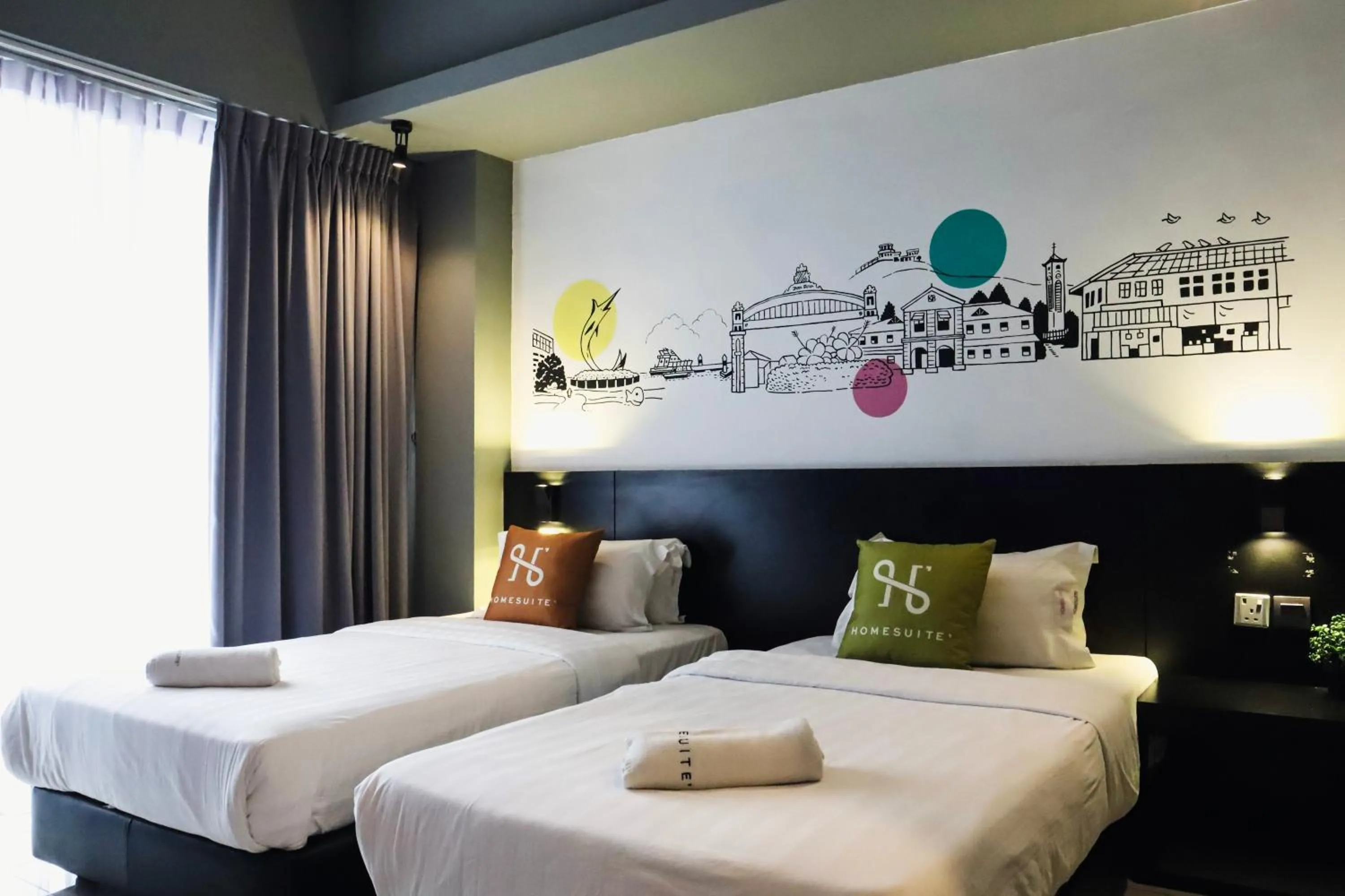 Bed in Homesuite' Home at Aeropod SOVO