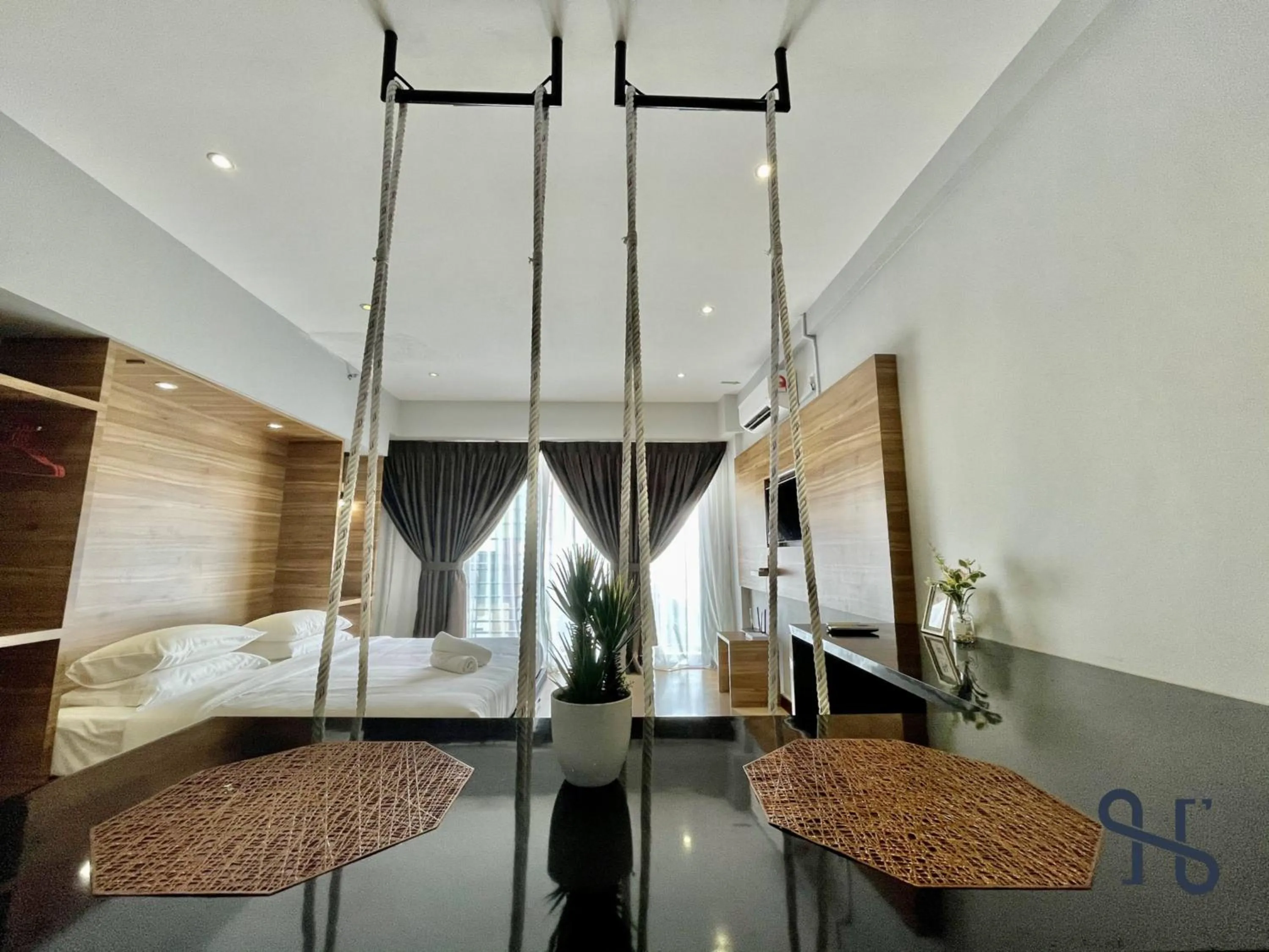 Photo of the whole room, Bed in Homesuite' Home at Aeropod SOVO