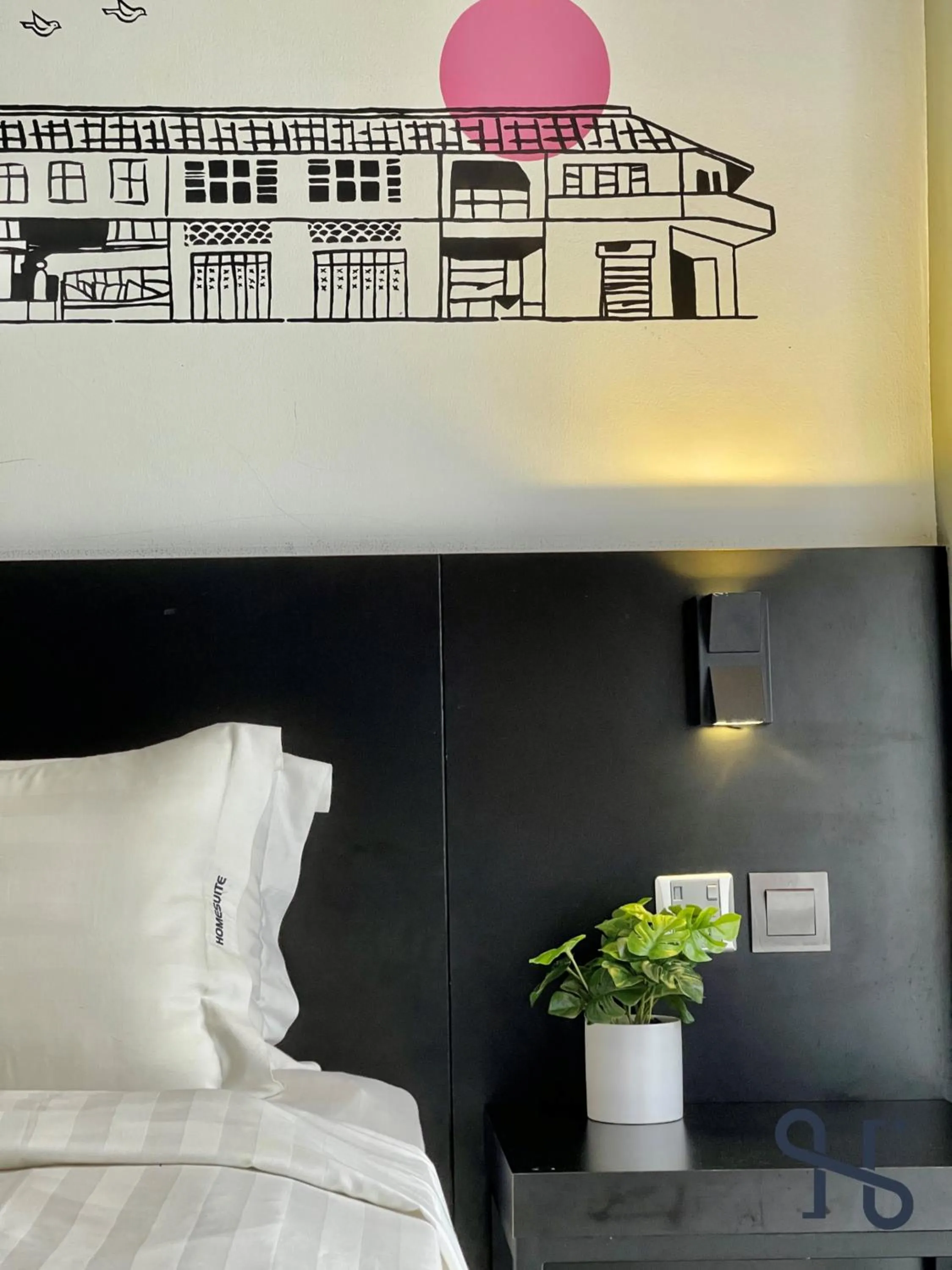 Bed in Homesuite' Home at Aeropod SOVO