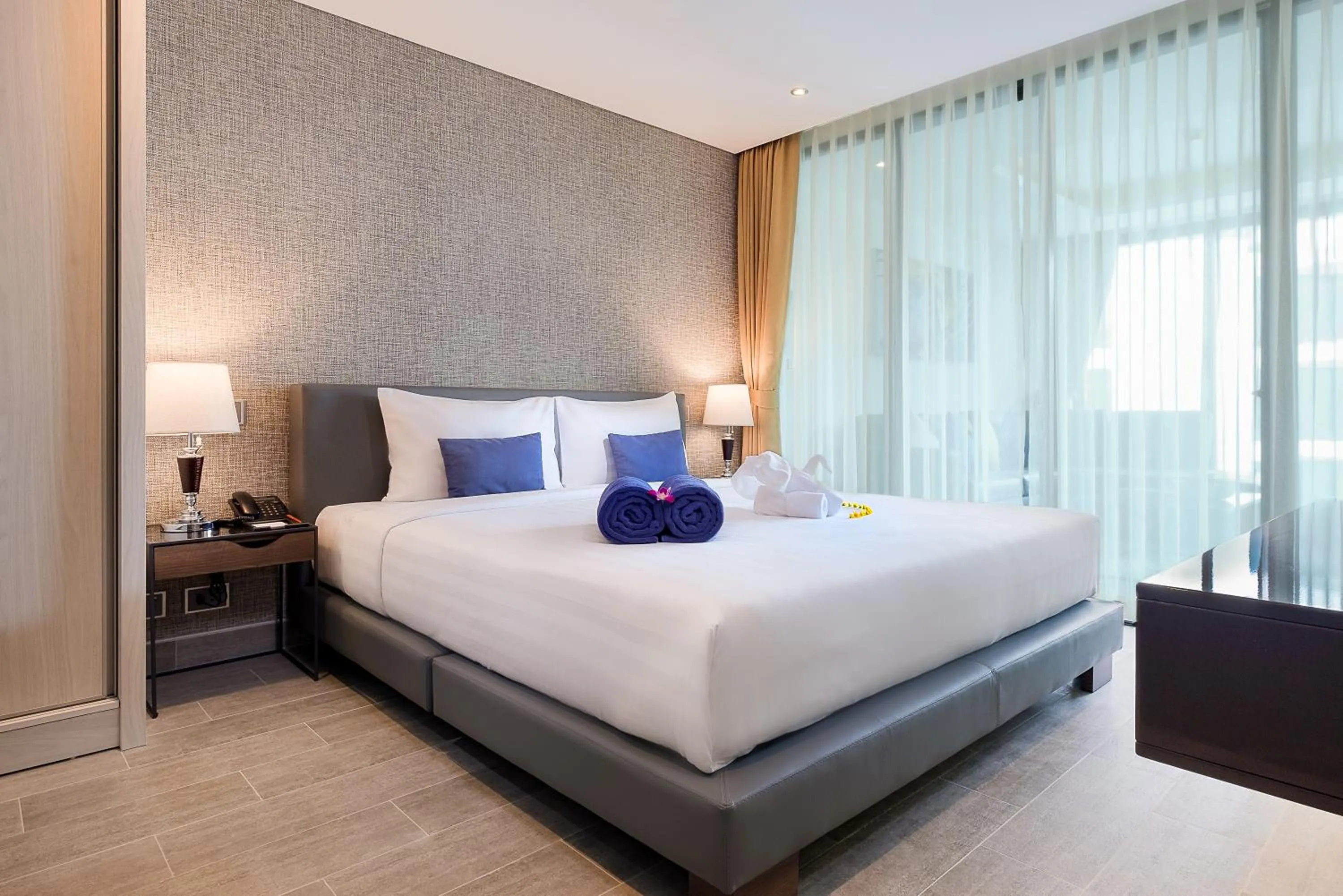 Bed in Lets Phuket Twin Sands Resort & Spa