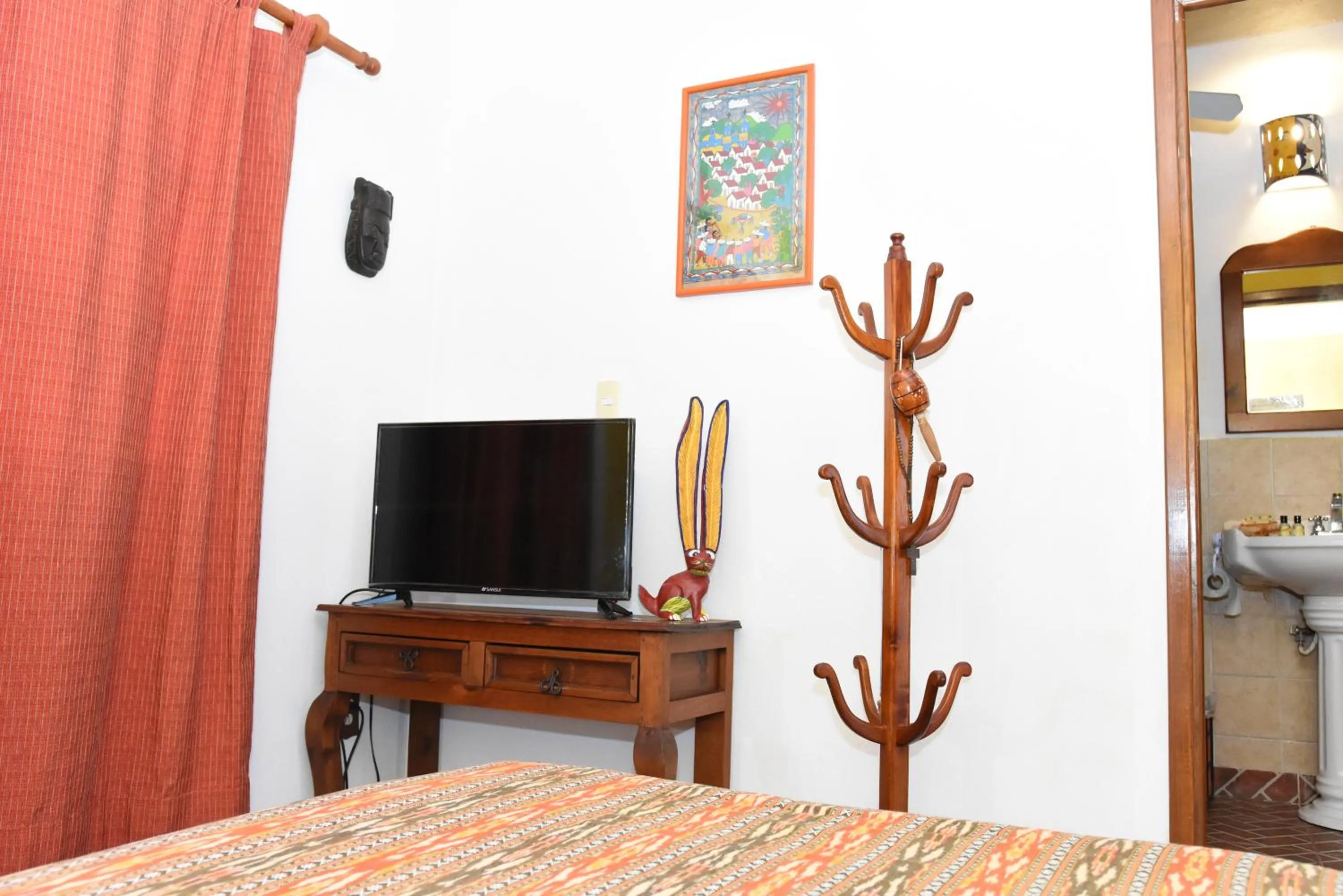 TV and multimedia, Bed in Cancun Guest House 2