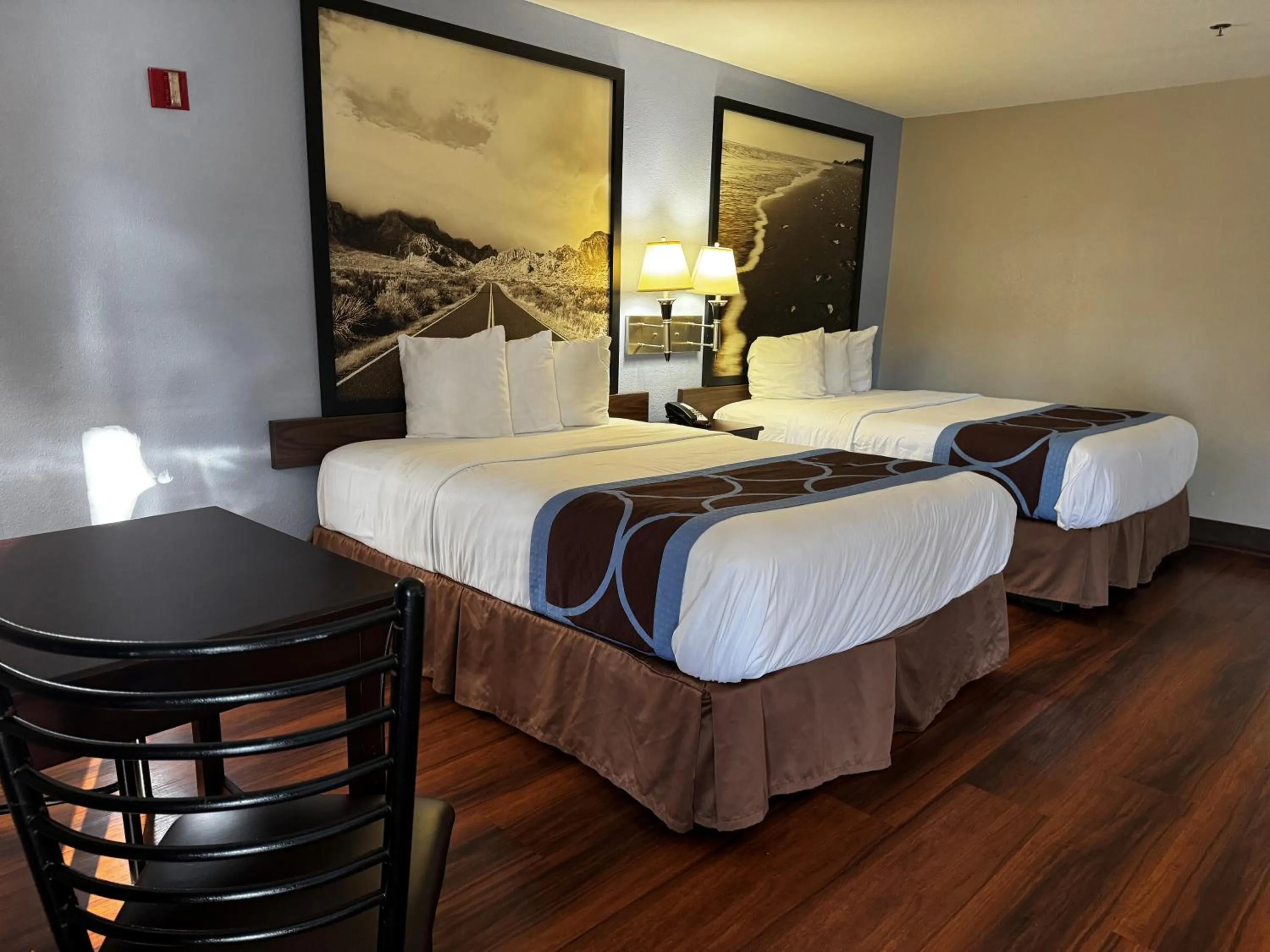 Photo of the whole room, Bed in Super 8 by Wyndham Houston Webster NASA