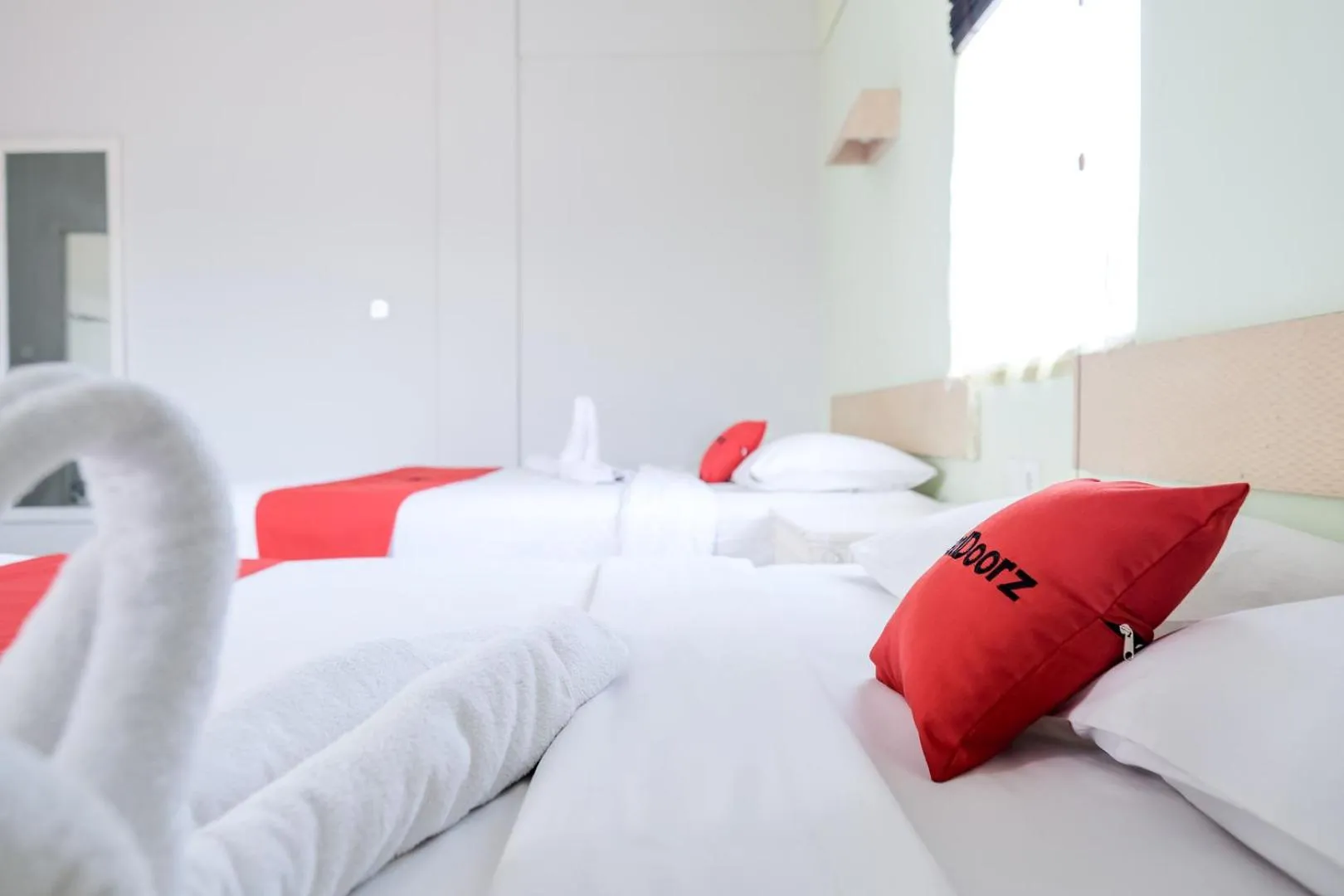 Bed in RedDoorz Plus at Sunrise Hotel Sanur