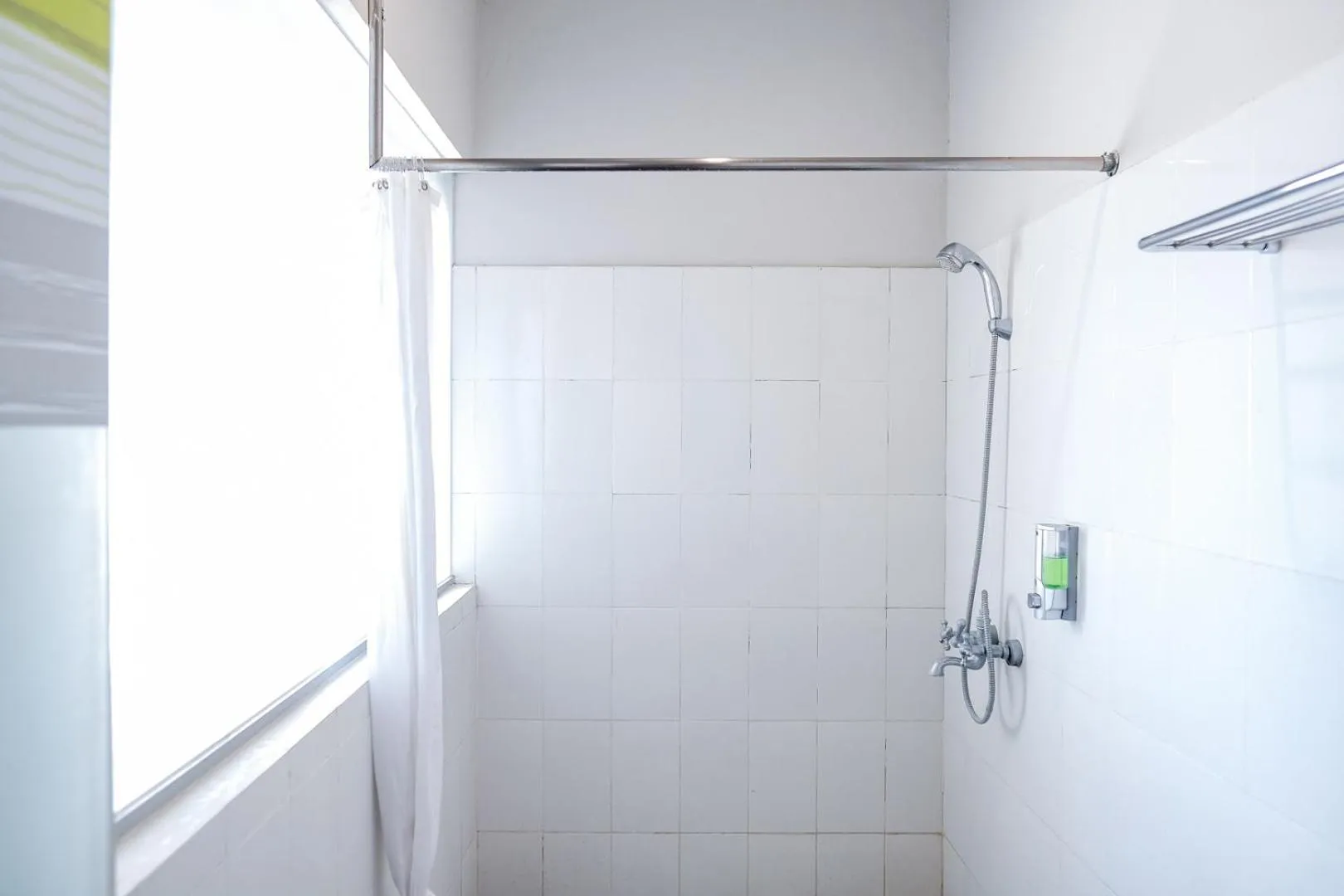 Shower in RedDoorz Plus at Sunrise Hotel Sanur