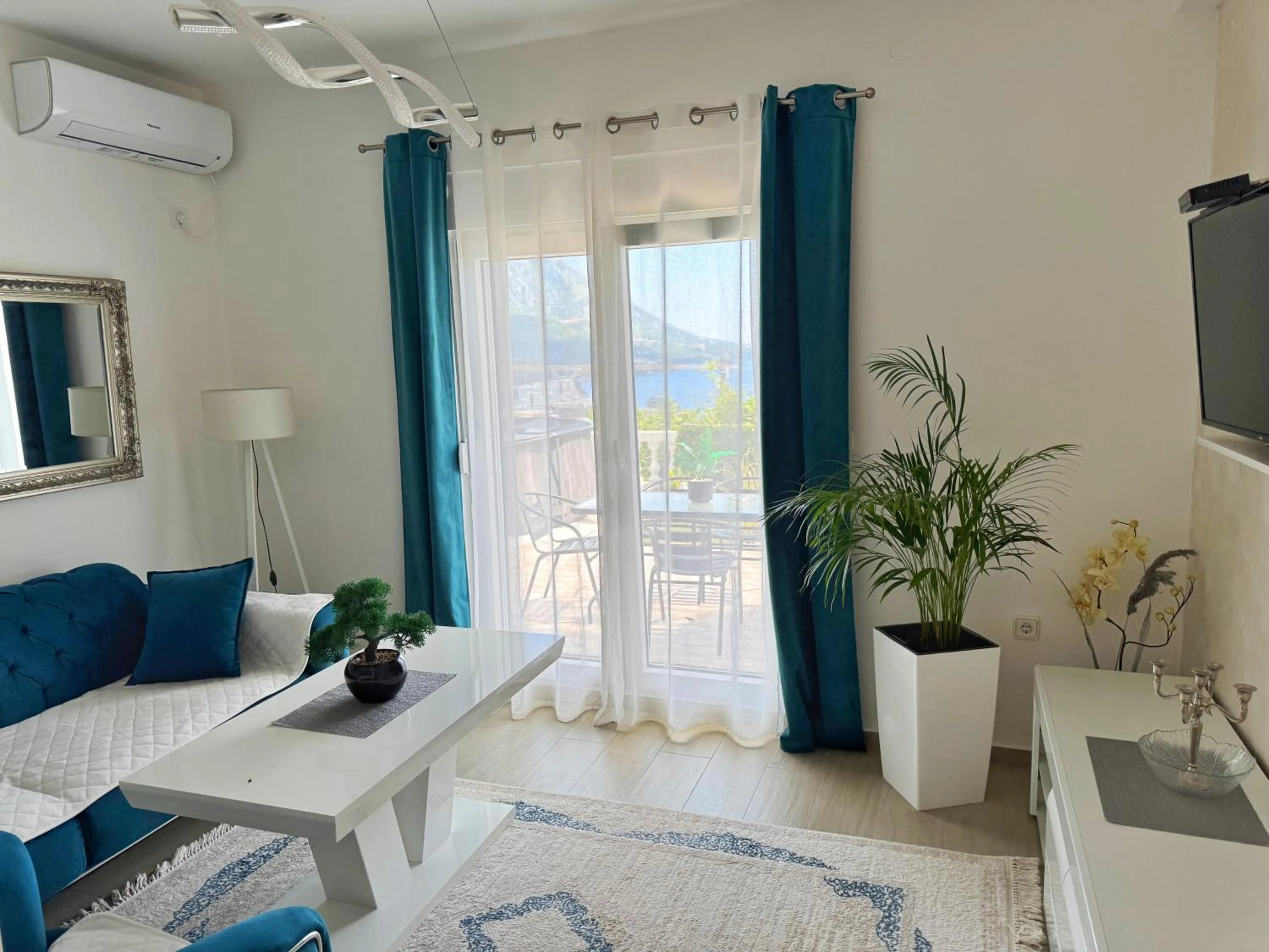 Living room, Bed in Apartmani Avanti Becici