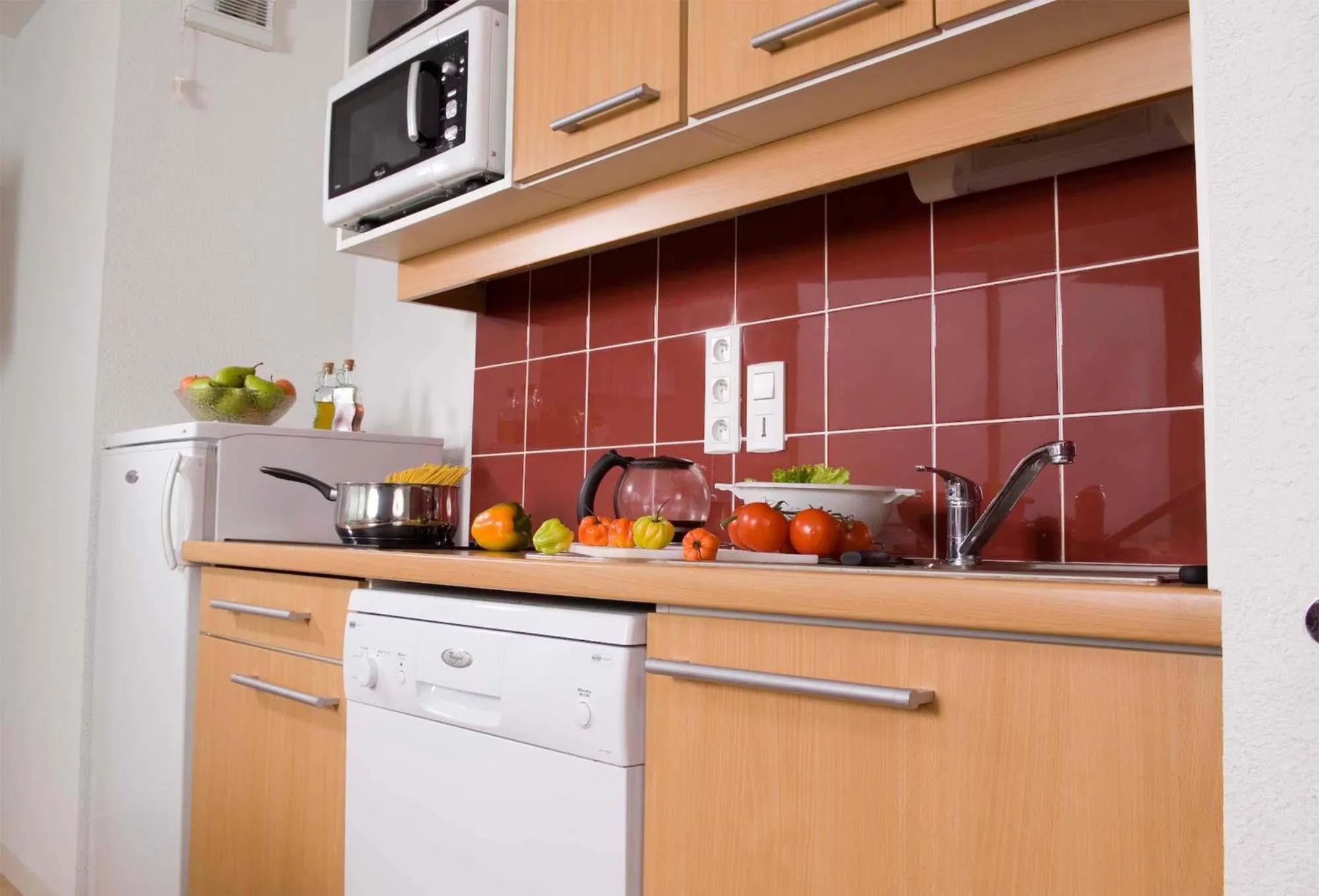 Kitchen or kitchenette in Madame Vacances Les Terrasses De La Plage