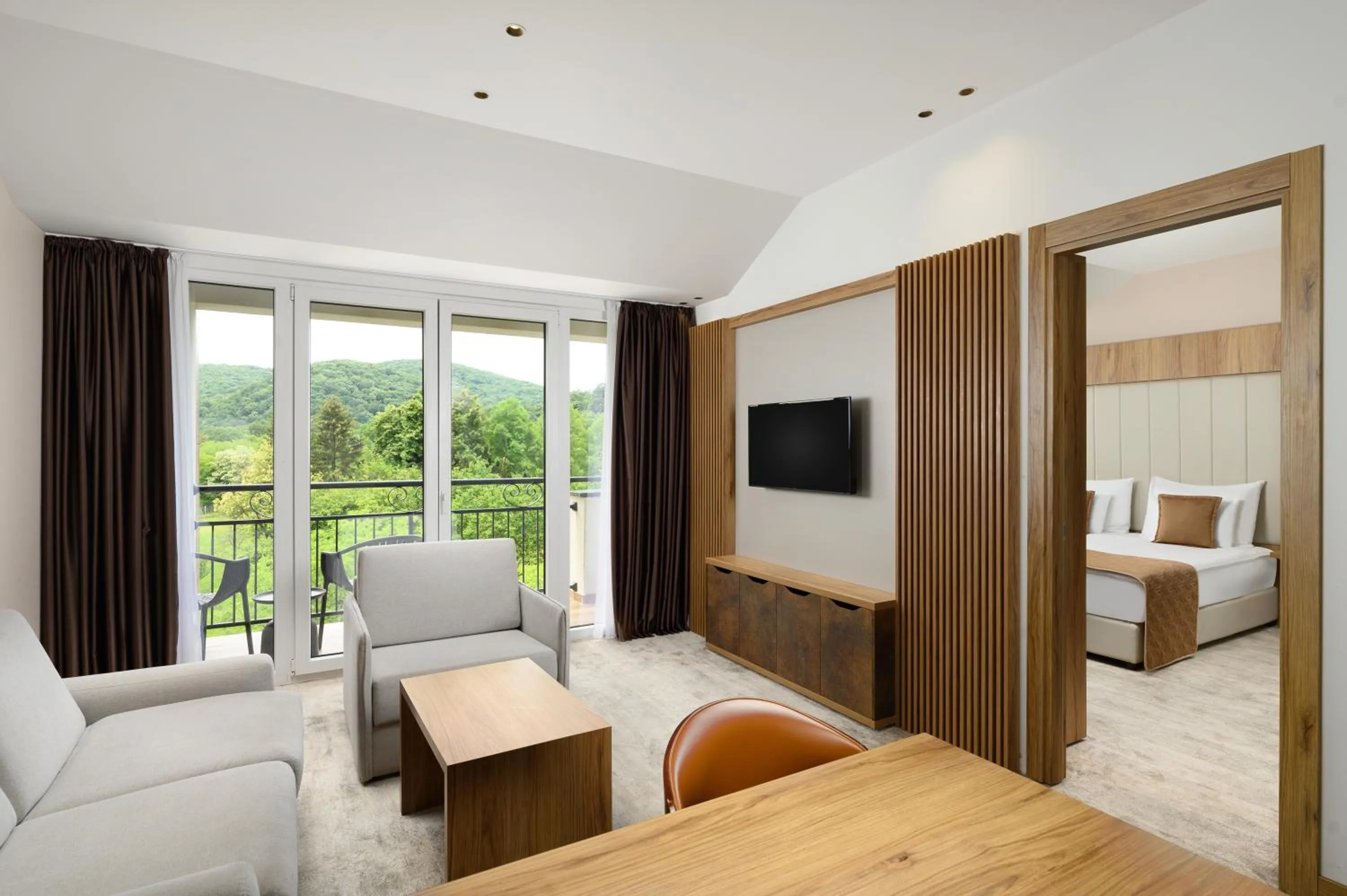 Seating area, Bed in Movenpick Resort and Spa Fruske Terme