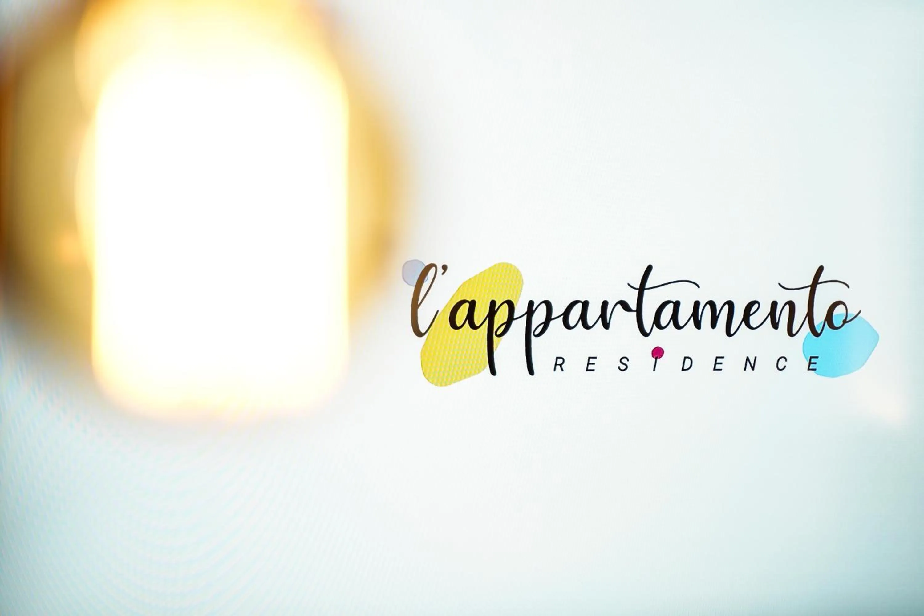 Property logo or sign in Residence l'Appartamento