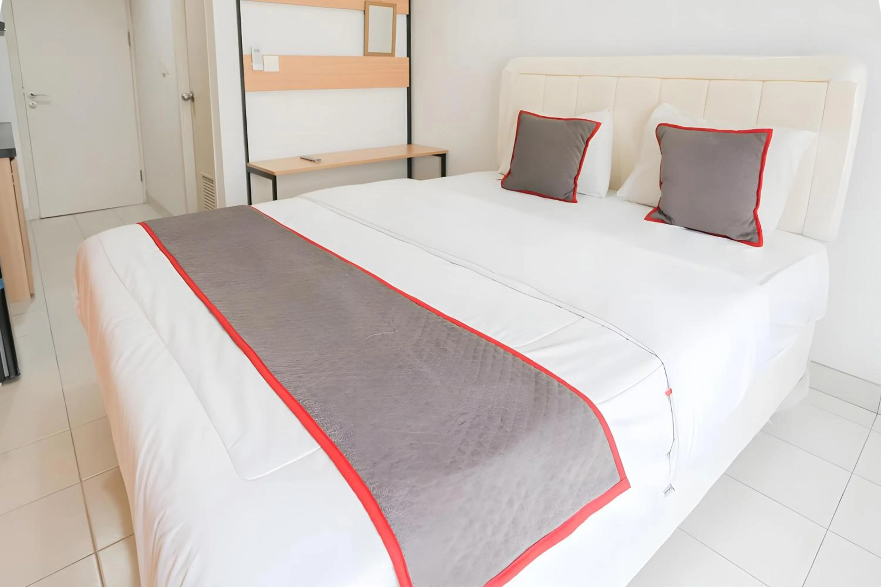 Bedroom in Capital O Urbano