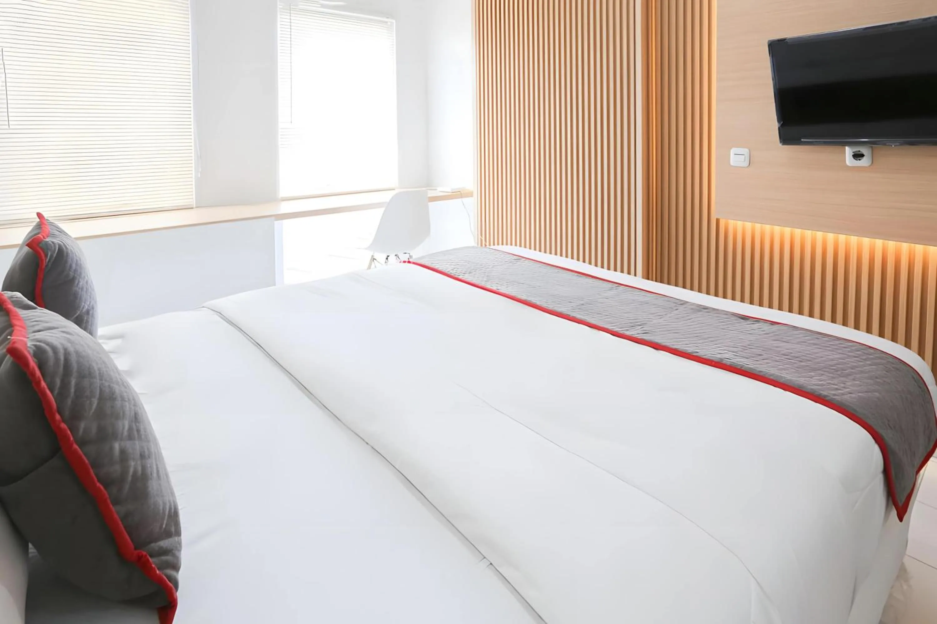 Bedroom in Capital O Urbano