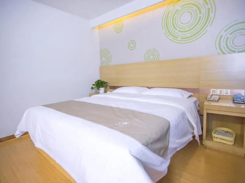 Bed in GreenTree Inn Jinan Jiyang Bus Station Express Hotel