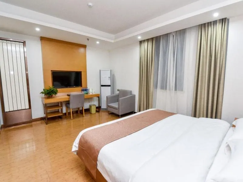 Bed in GreenTree Inn Xuchang Yucheng County Ziyun Avenue Business Hotel
