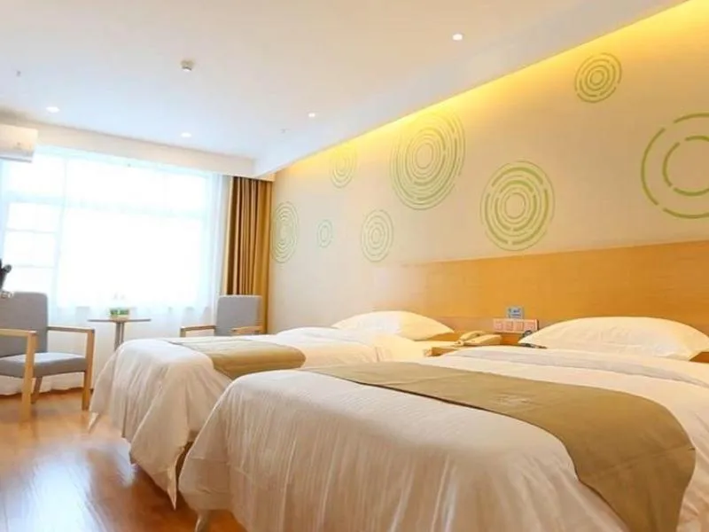 Bed in GreenTree Inn Taizhou Taixing City Xuanbao Town Zhongyang Road Express Hotel