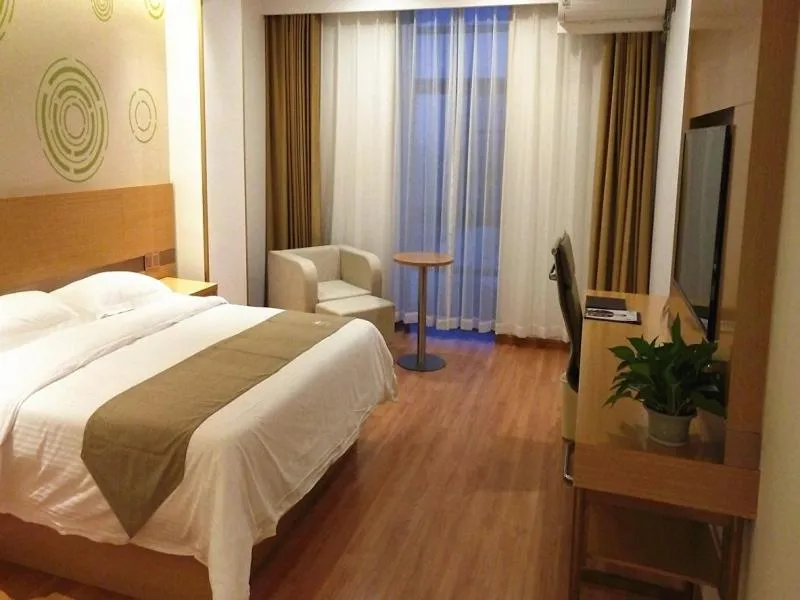 Bed in GreenTree Inn Taizhou Taixing City Xuanbao Town Zhongyang Road Express Hotel