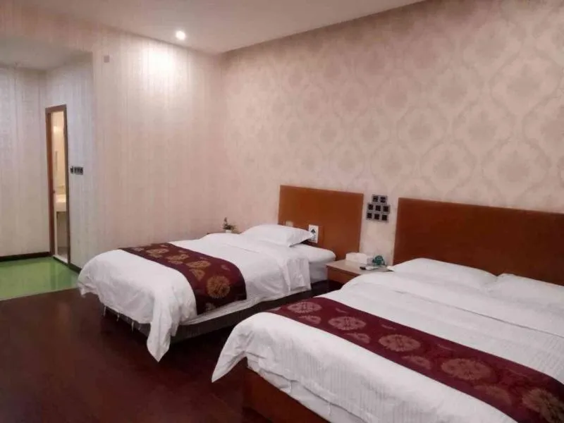 Bed in GreenTree Inn Ziyang Lezhi Government Tianchi Town Express Hotel