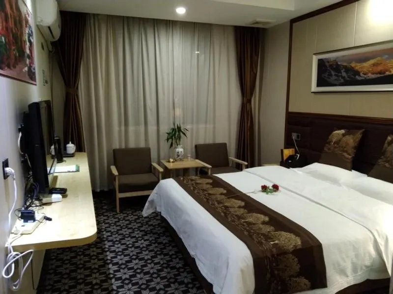 Bed in GreenTree Alliance Xinyang Pingqiao District Nanjing Road Dongyang Hotel