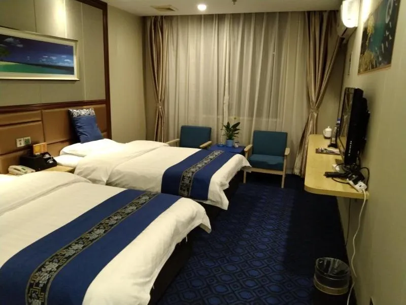 Bed in GreenTree Alliance Xinyang Pingqiao District Nanjing Road Dongyang Hotel