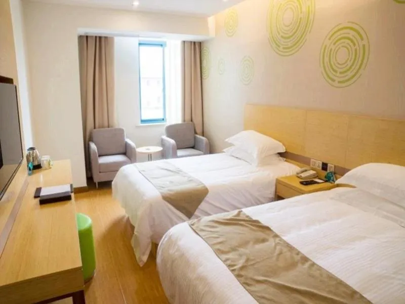 Bed in GreenTree Inn Nantong Qidong Binhai Industrial Park Nanhai RoadExpress Hotel