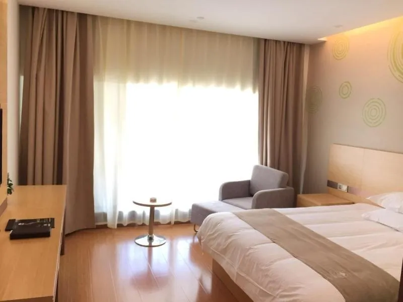 Bed in GreenTree Inn Nantong Qidong Binhai Industrial Park Nanhai RoadExpress Hotel